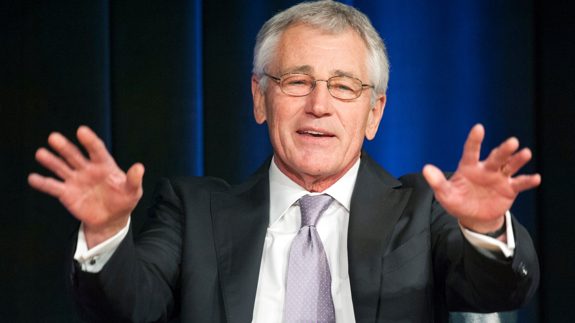 In this Jan. 24, 2014, photo, Secretary of Defense Chuck Hagel talks with the audience before administering the oath of office to Deborah Lee James during her swearing-in ceremony as Secretary of the Air Force, at the Pentagon in Washington. (AP Photo/Cliff Owen)