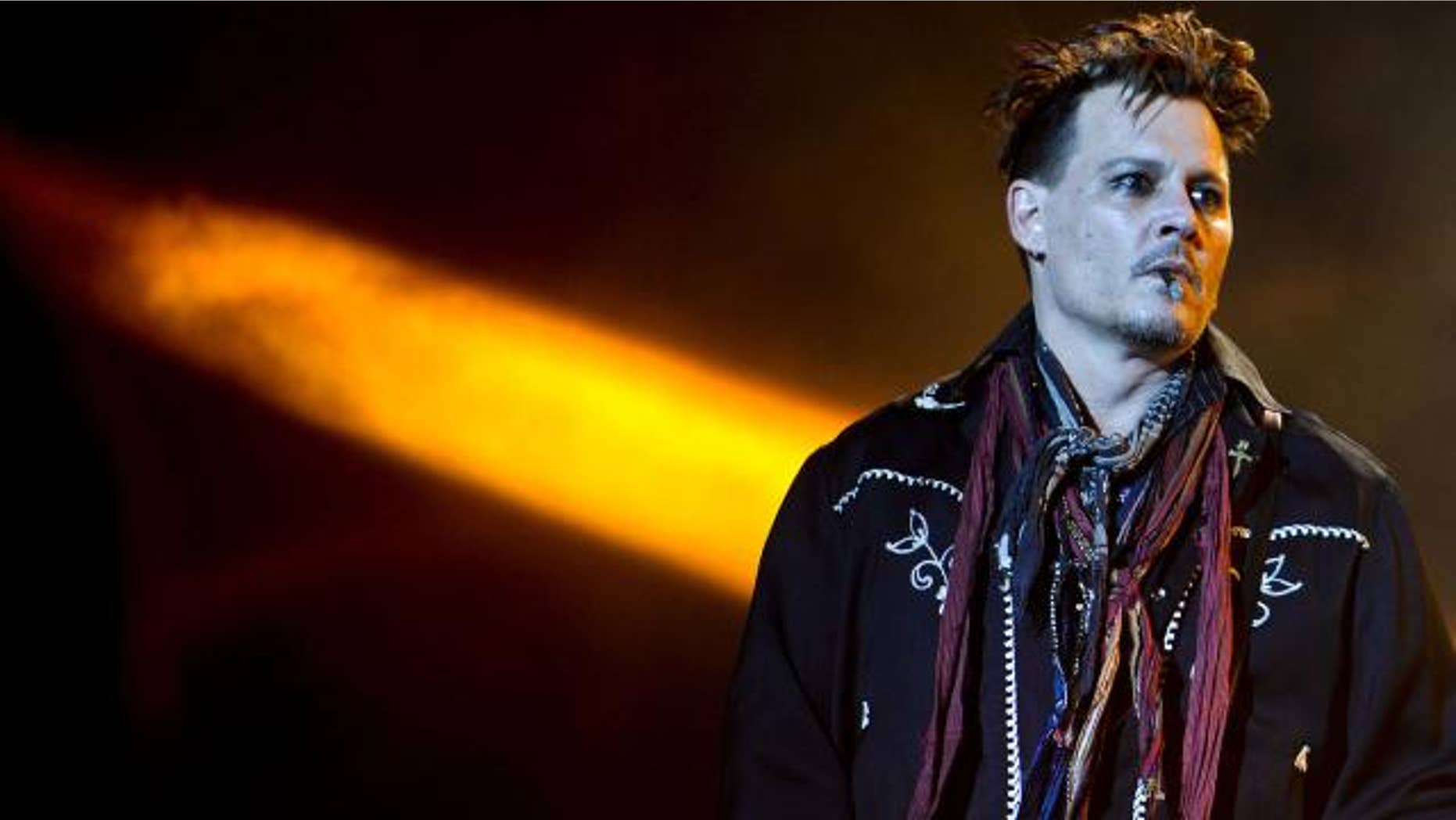 Johnny Depp hits the stage in Portugal.