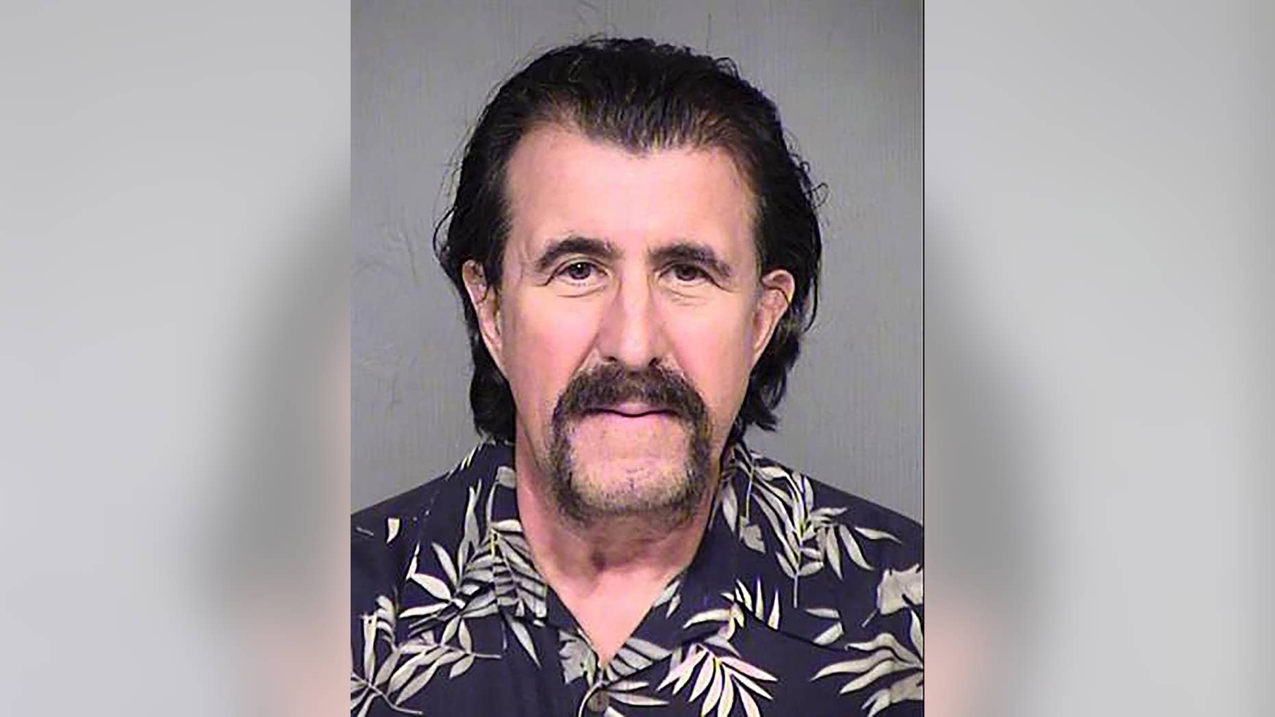 FILE – This Oct. 8, 2015, file photo, provided by the Maricopa County Sheriff's Office in Phoenix, Ariz., shows Sam Perone after his arrest in connection with a 1992 murder case in Ohio. Perone was sentenced to 11 years in prison after pleading guilty Tuesday, Oct. 18, 2016, to voluntary manslaughter and gross abuse of a corpse in the 1992 death of Richard Woods, of Dublin, Ohio, a rival furniture salesman whose body was found in a ravine with gunshot wounds to the head. (Maricopa County Sheriff's Office via AP, File)