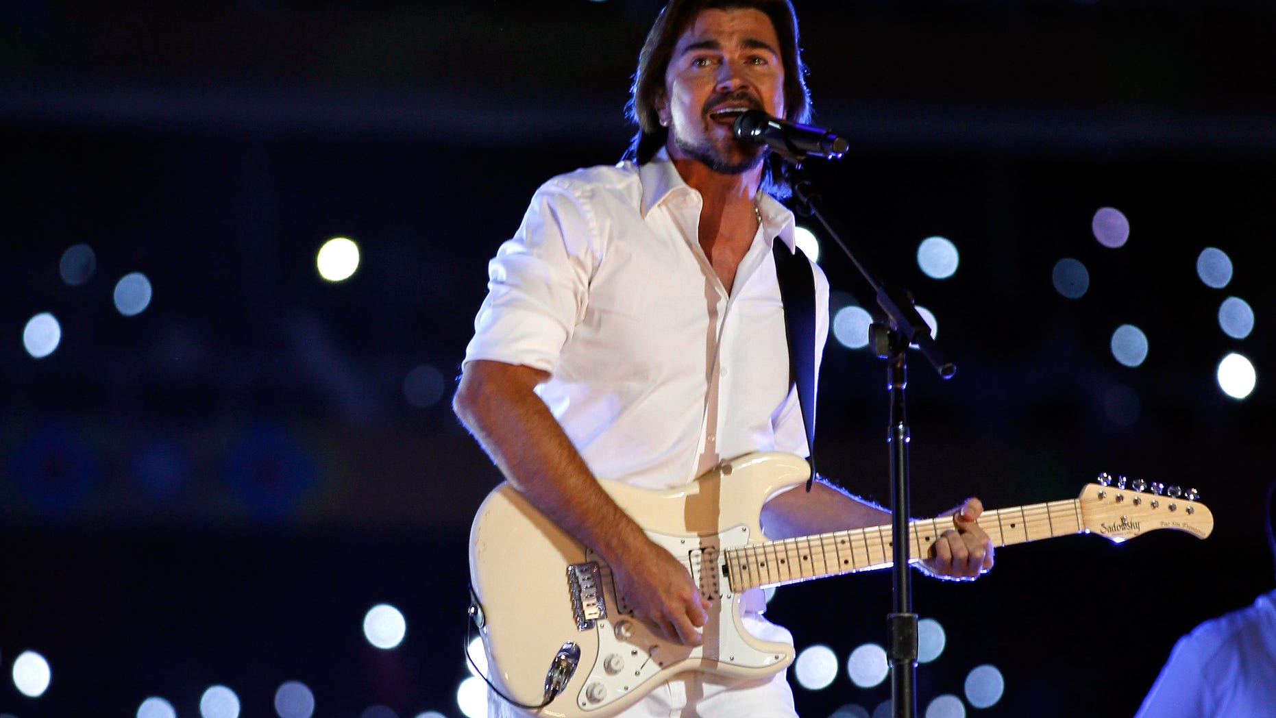 Juanes performs during the Opening Ceremony for the XVI Pan American Games at Omnilife Stadium on October 14, 2011 in Guadalajara, Mexico.