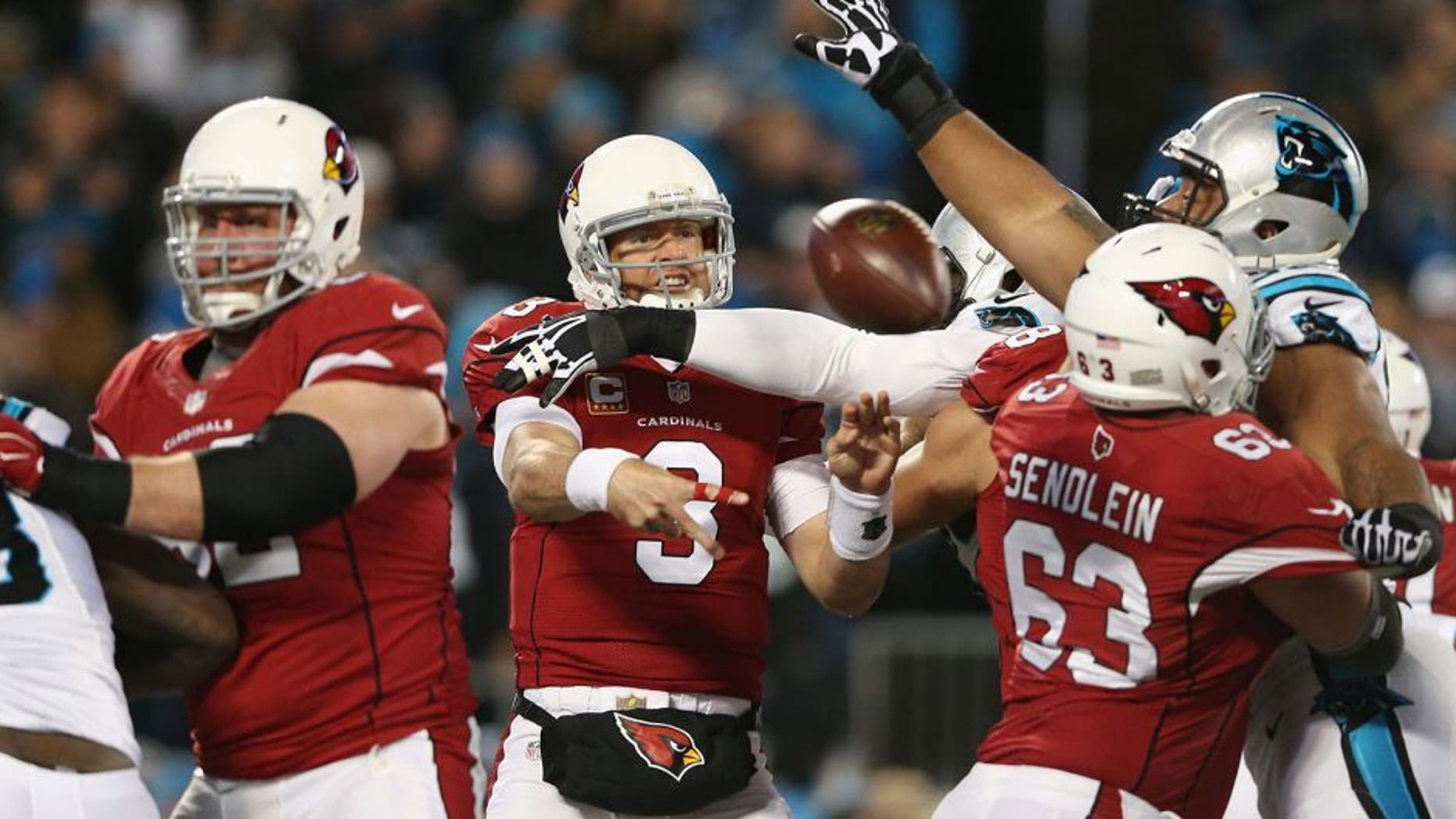 CHARLOTTE, NC - JANUARY 24: Carson Palmer #3 of the Arizona Cardinals throws an incomplete pass in the first half against the Carolina Panthers during the NFC Championship Game at Bank of America Stadium on January 24, 2016 in Charlotte, North Carolina. (Photo by Streeter Lecka/Getty Images)