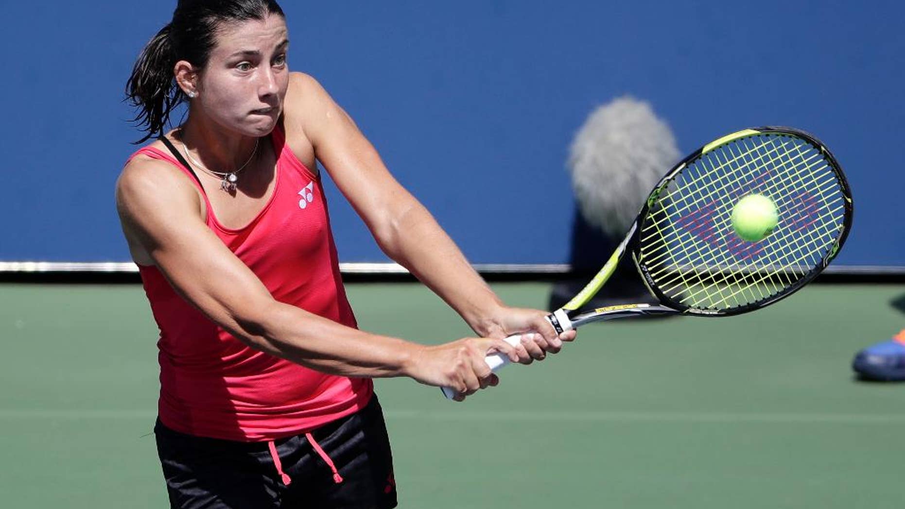 Anastasija Sevastova, of Latvia, returns a shot to Kateryna Bondarenko, of Ukraine, during the third round of the U.S. Open tennis tournament, Friday, Sept. 2, 2016, in New York. (AP Photo/Seth Wenig)