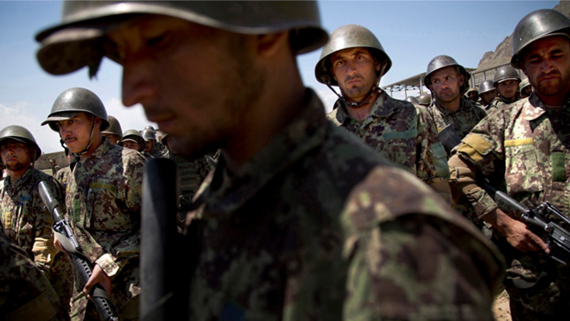 May 8, 2013: In this file photo, Afghan Army soldiers gather at a training facility in the outskirts of Kabul, Afghanistan.