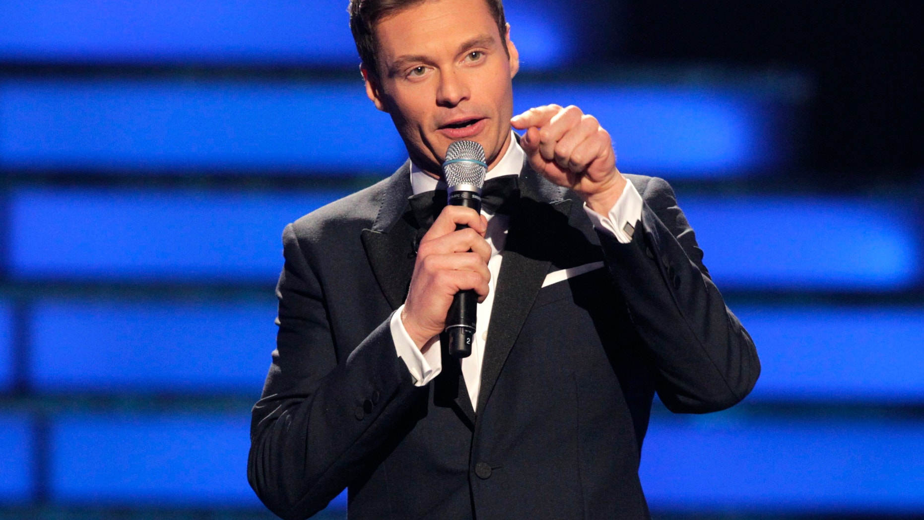 Host Ryan Seacrest presides over the 11th season finale of "American Idol" in Los Angeles, California, May 23, 2012.
