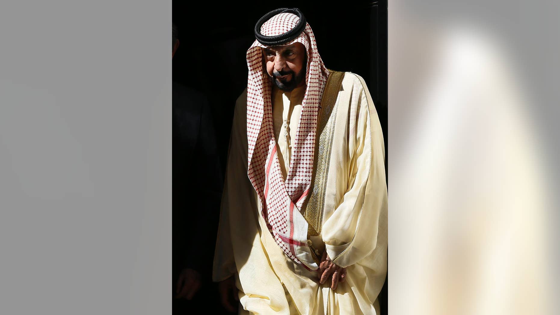 FILE- In this May 1, 2013 file photo, president of the United Arab Emirates Sheik Khalifa bin Zayed Al Nahyan leaves Downing Street after a meeting with Britain's Prime Minister David Cameron, in London. Al Nahyan, the leader of the United Arab Emirates, who has rarely been seen since suffering a stroke nearly three years ago, has left his country for a "private visit" abroad. The state-run WAM news agency announced his trip on Thursday, Jan. 5, 2017. It did not say where he went. (AP Photo/Kirsty Wigglesworth, File)