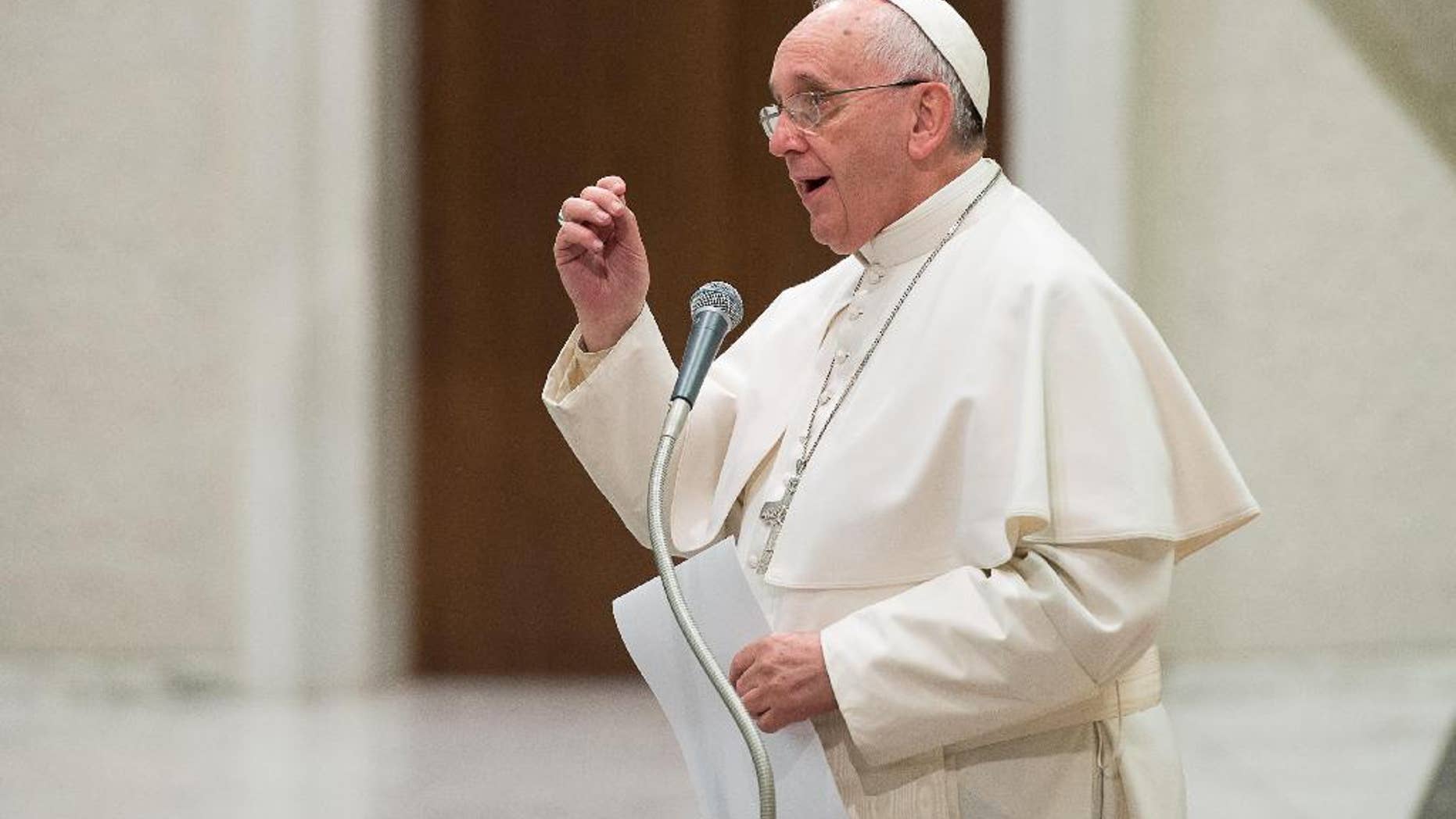 Pope Francis delivers his message on the occasion of an audience granted to members of the Italian Confcooperative, cooperative associations, in the Paul VI hall at the Vatican, Saturday, Feb. 28, 2015. (AP Photo/L'Osservatore Romano, Pool)