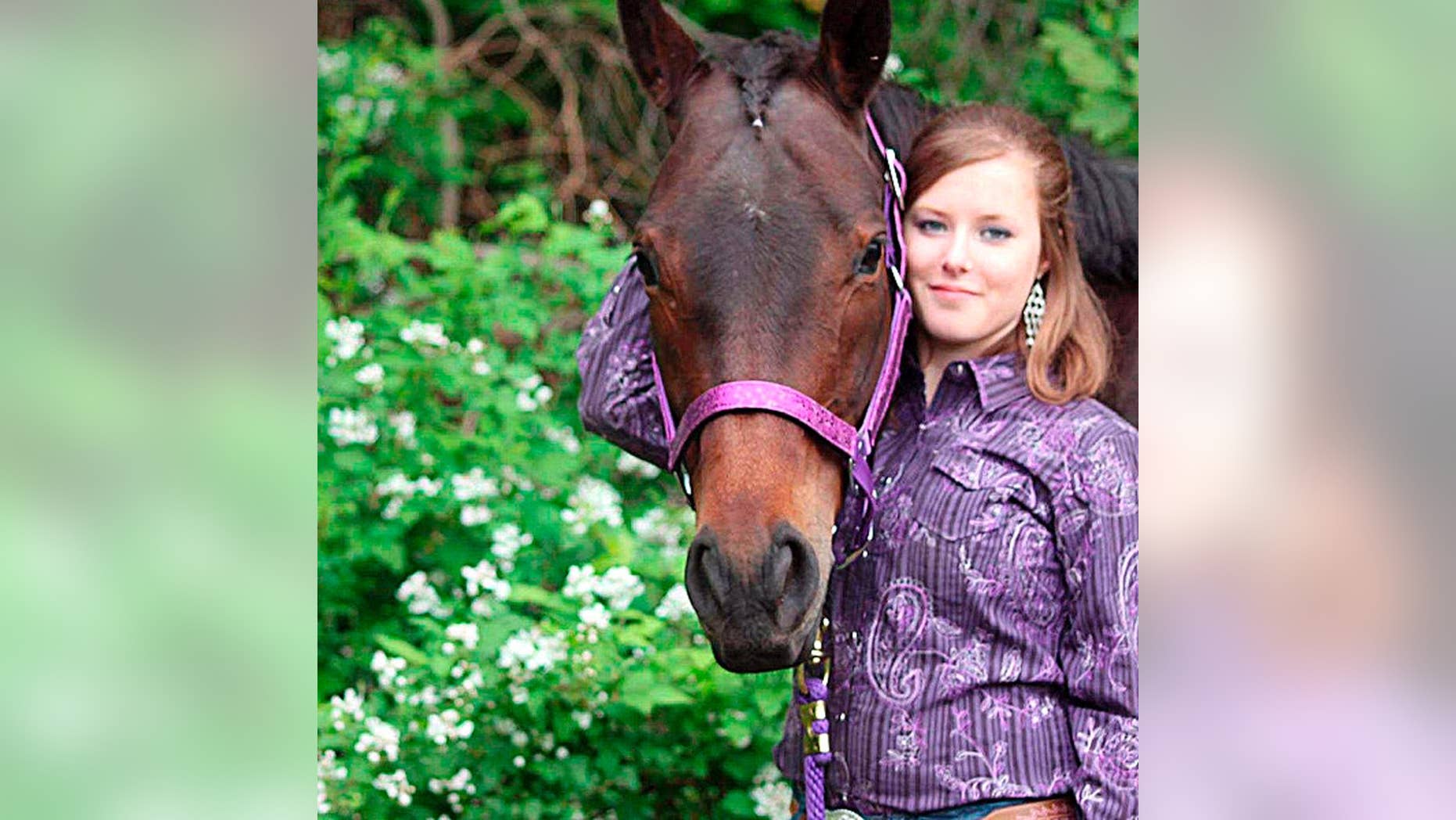 FILE - This undated file photo provided by the San Bernardino County, Calif., Sheriff's Department shows Erin Corwin. Corwin disappeared after leaving her home on the Twentynine Palms Marine Corps base June 28, 2014. Christopher Brandon Lee, 24, a recently discharged Marine who volunteered at a horse ranch with Corwin, was arrested July 4, 2014, on suspicion of possession of a destructive device. Lee, the alleged lover of Corwin, was arrested Sunday, Aug. 17, 2014, in Alaska in connection with Corwin's disappearance, the sheriff's department announced Monday, Aug. 18, 2014. (AP Photo/San Bernardino County Sheriff's Department, File)