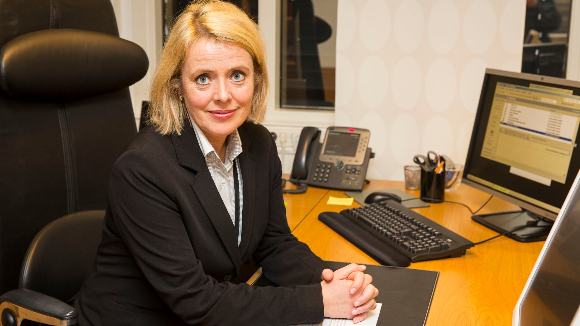 Marie Benedicte Bjoernland, the head of the Norwegian domestic intelligence service PST, poses for a picture in her office in Oslo, Norway Wednesday Oct. 23 2013 during an interview with the Associated Press. PST tried to prevent one of the suspected gunmen in the Nairobi mall attack from joining Somali militants more than three years ago, but failed to talk him out of it, Bjoernland said. The man has been identified in Kenya as Hassan Abdi Dhuhulow, a 23-year-old Somalia native whose family moved to Norway in 1999. (AP Photo/Tor Lindseth)