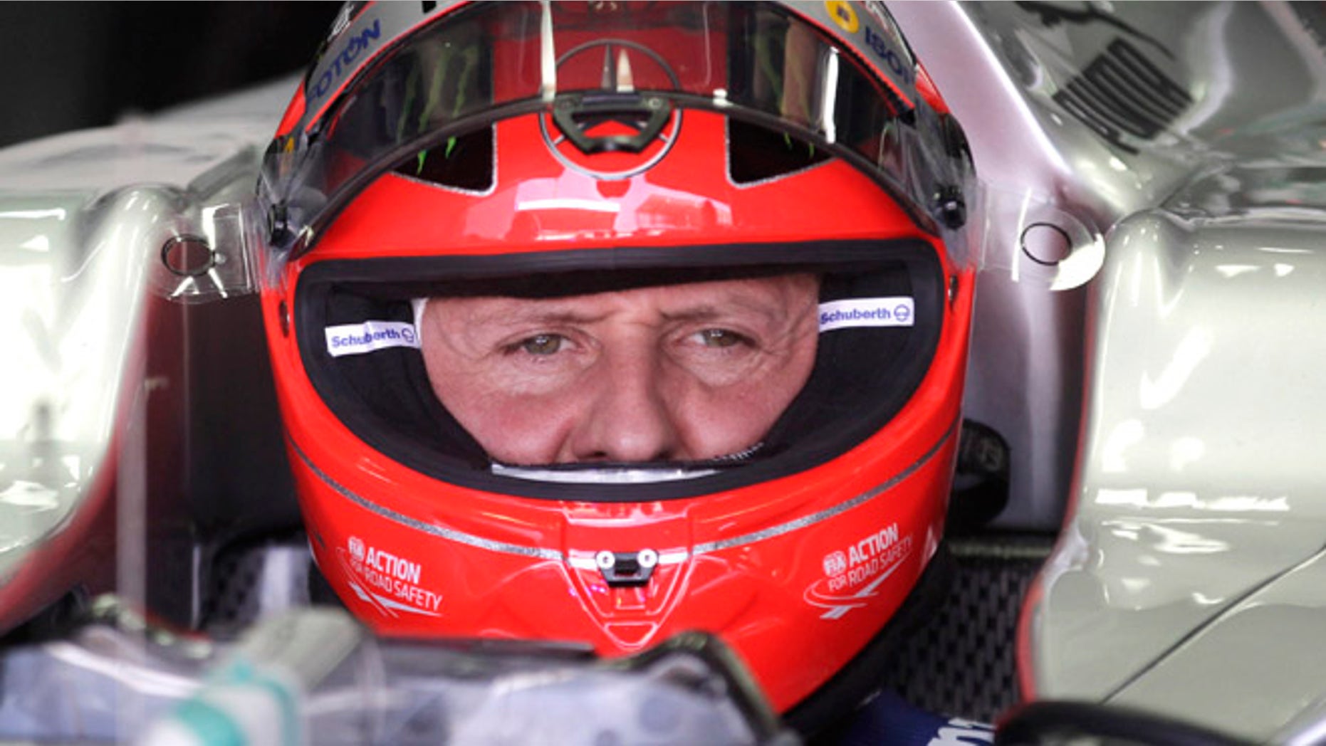 FILE - In this Nov. 23, 2012 file photo, Grand Prix driver Michael Schumacher, of Germany, sits in his car during a free practice at the Interlagos race track in Sao Paulo, Brazil. (AP Photo/Victor Caivano, File)