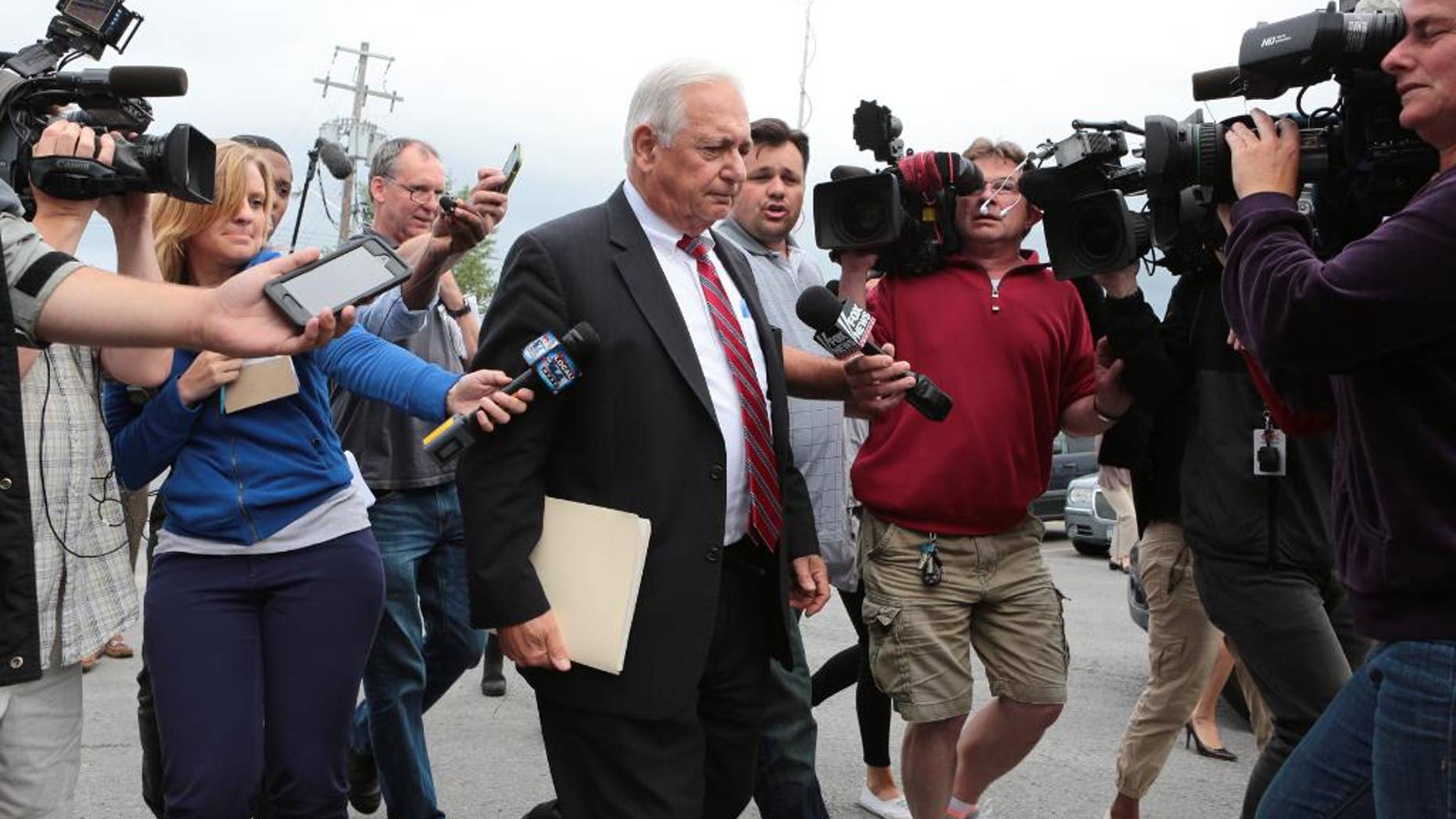 William Dreyer, attorney for Suspended Clinton Correctional Facility corrections officer Gene Palmer, leaves Plattsburgh Town Court after waving waiving his clients' preliminary hearing Monday, June 29, 2015, in Plattsburgh, N.Y. Palmer faces charges of promoting prison contraband, tampering with physical evidence and official misconduct in connection with the escape of convicted killers Richard Matt and David Sweat. (Gabe Dickens/The Press-Republican via AP)
