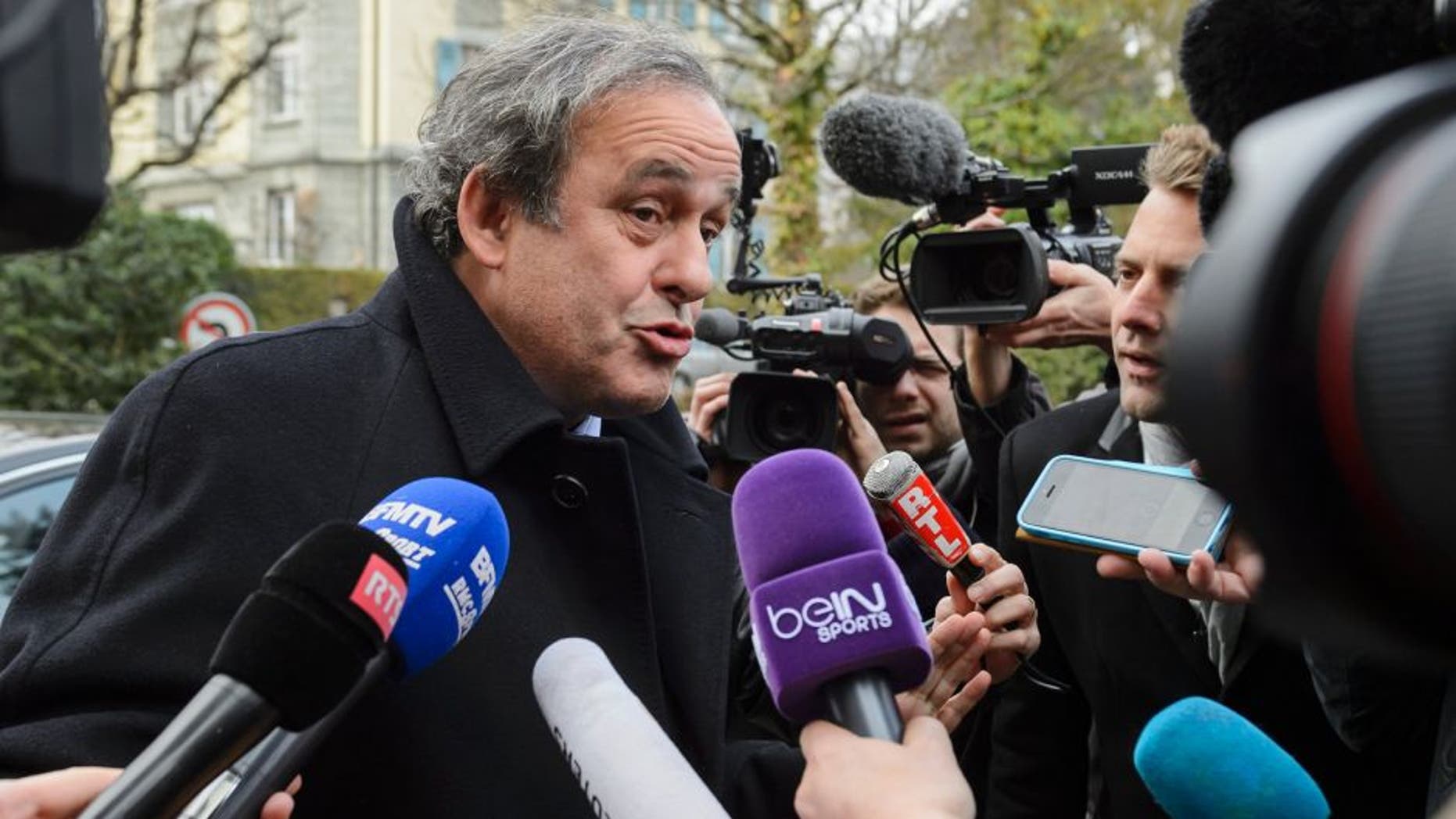 UEFA president and FIFA vice president Michel Platini speaks to the press as he arrives at the Court of Arbitration for Sport (CAS) to appeal against a 90-day suspension in Lausanne on December 8, 2015. The appeal is part of a new campaign by Platini to get back into the election for a new FIFA leader on February 26. / AFP / FABRICE COFFRINI (Photo credit should read FABRICE COFFRINI/AFP/Getty Images)