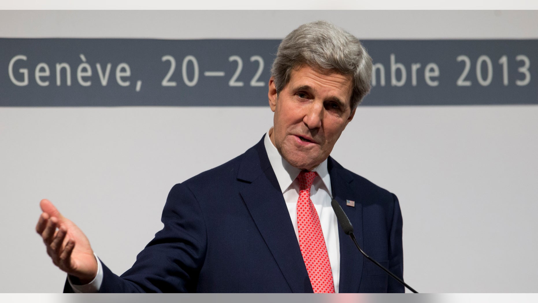 U.S. Secretary of State John Kerry gestures as he speaks to the media about the deal that has been reached between six world powers and Iran that calls on Tehran to limit its nuclear activities in return for sanctions relief, at the International Conference Centre of Geneva, Sunday, Nov. 24, 2013, in Geneva, Switzerland, (AP Photo/Carolyn Kaster, Pool)