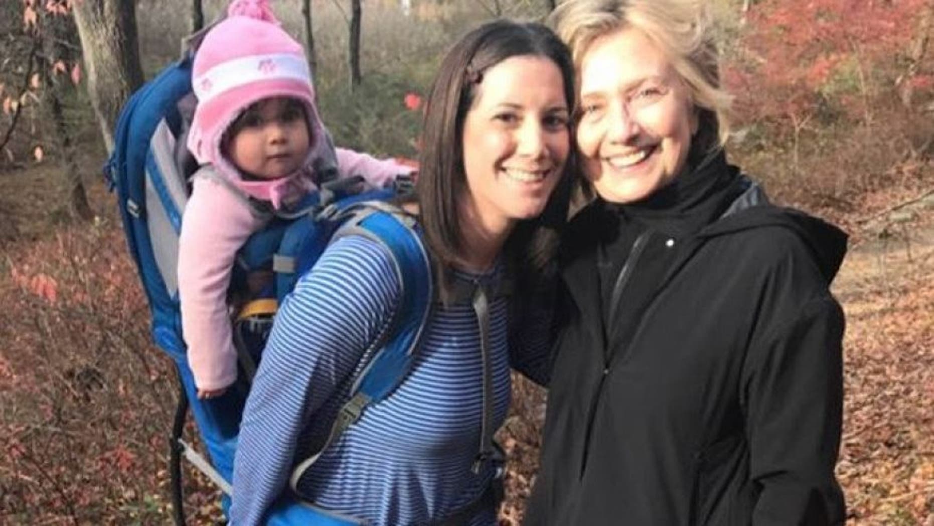 Margot Gerster and daughter Phoebe pose for a picture with Hillary Clinton near Clinton's home in Chappaqua, N.Y.