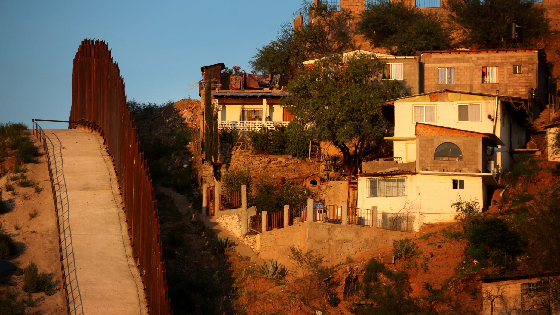 NOGALES, AZ - JULY 6: The border wall between the U.S. and Mexico is seen July 6, 2012 in Nogales, Arizona. The president-elect of Mexico, Enrique Peña Nieto, stated that he wants to expand his country's drug-war partnership with the United States but that he would not support the presence of armed American agents in Mexico. (Photo by Sandy Huffaker/Getty Images)