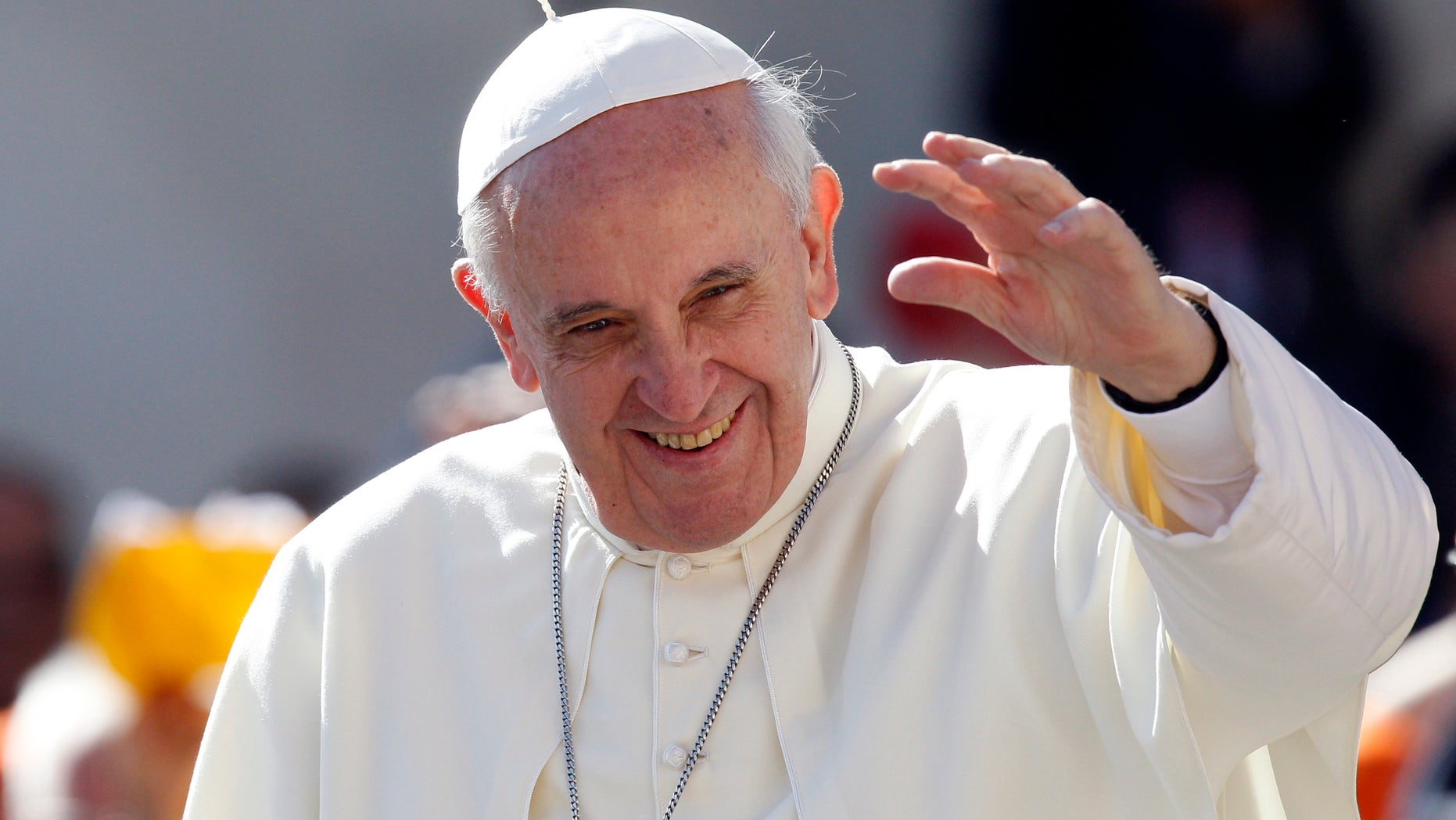 FILE - In this Sept. 18, 2013 file photo, Pope Francis waves to faithful as he arrives for his weekly general audience in St. Peter's Square at the Vatican. Pope Francis convenes his parallel cabinet on Tuesday, Oct. 1, 2013, for a first round of talks on reforming the Catholic Church, bringing eight cardinals from around the globe together in a novel initiative to get local church leaders involved in helping make decisions for the 1.2-billion strong universal Catholic Church. (AP Photo/Riccardo De Luca, File)
