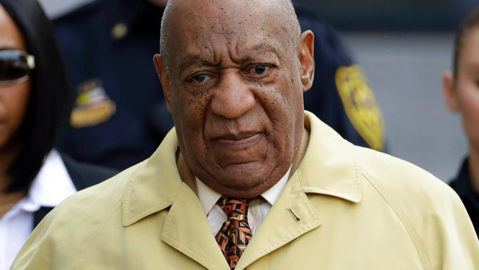 FILE - In this Feb. 27, 2017, file photo, Bill Cosby departs after a pretrial hearing in his sexual assault case at the Montgomery County Courthouse in Norristown, Pa. Jury selection in Bill Cosby's criminal sex assault case is set to get underway May 22 in Pittsburgh. But the trial will be held nearly 300 miles away in suburban Philadelphia, with opening statements to start June 5. (AP Photo/Matt Slocum, File)