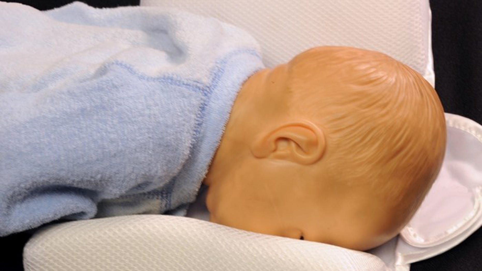Officials warned infant sleep positioners could cause babies to suffocate.