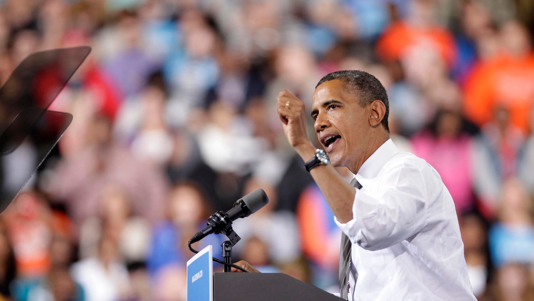 BOWLING GREEN, OH - SEPTEMBER 26: U.S. President Barack Obama speaks to supporters at the Stroh Center on September 26, 2012 in Bowling Green, Ohio. Six days before early voting starts in Ohio, the President discussed his plan to pay down the debt in a balanced way. (Photo by J.D. Pooley/Getty Images)