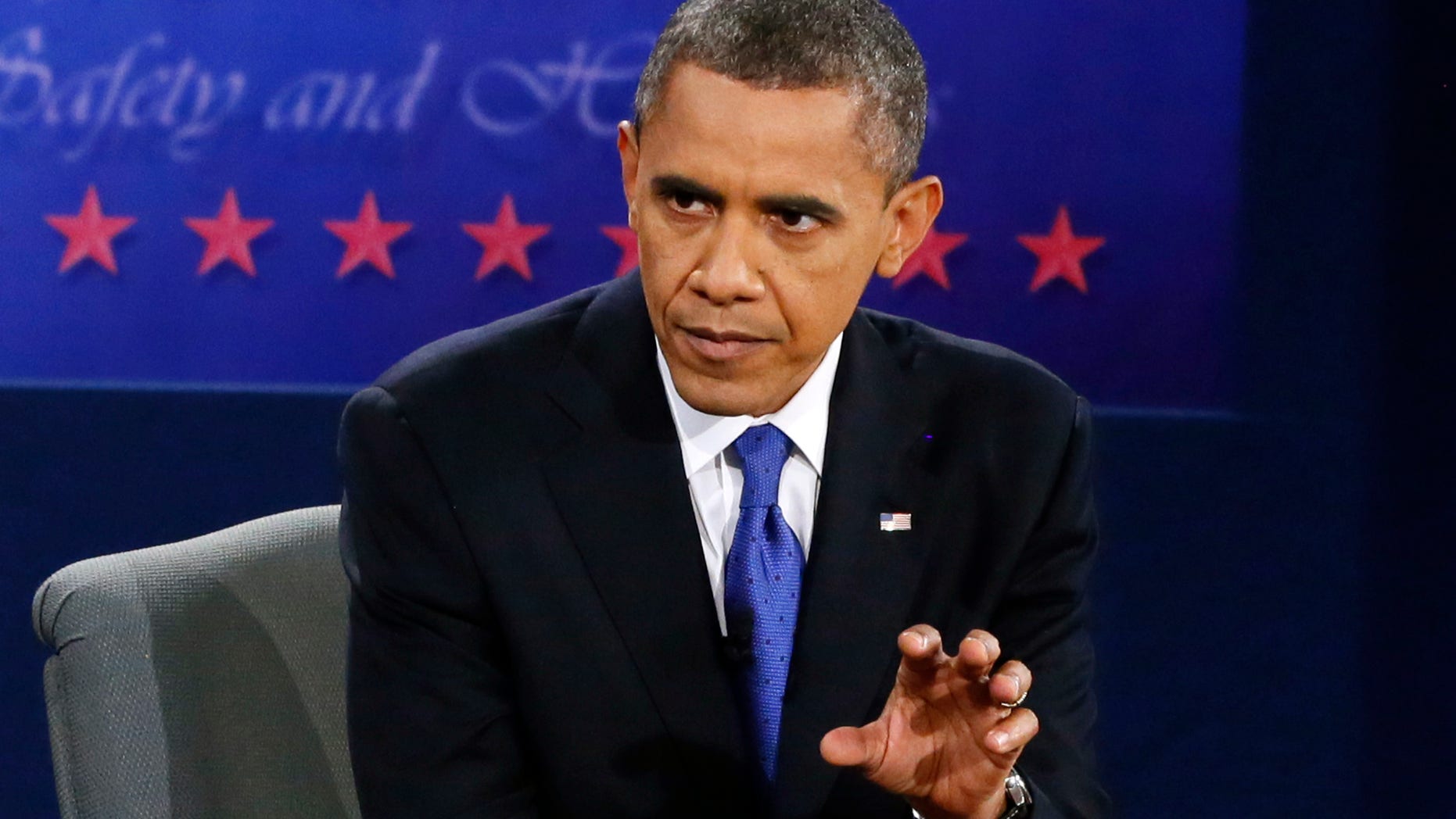 BOCA RATON, FL - OCTOBER 22: U.S. President Barack Obama debates with Republican presidential candidate Mitt Romney at the Keith C. and Elaine Johnson Wold Performing Arts Center at Lynn University on October 22, 2012 in Boca Raton, Florida. The focus for the final presidential debate before Election Day on November 6 is foreign policy. (Photo by Rick Wilking-Pool/Getty Images)