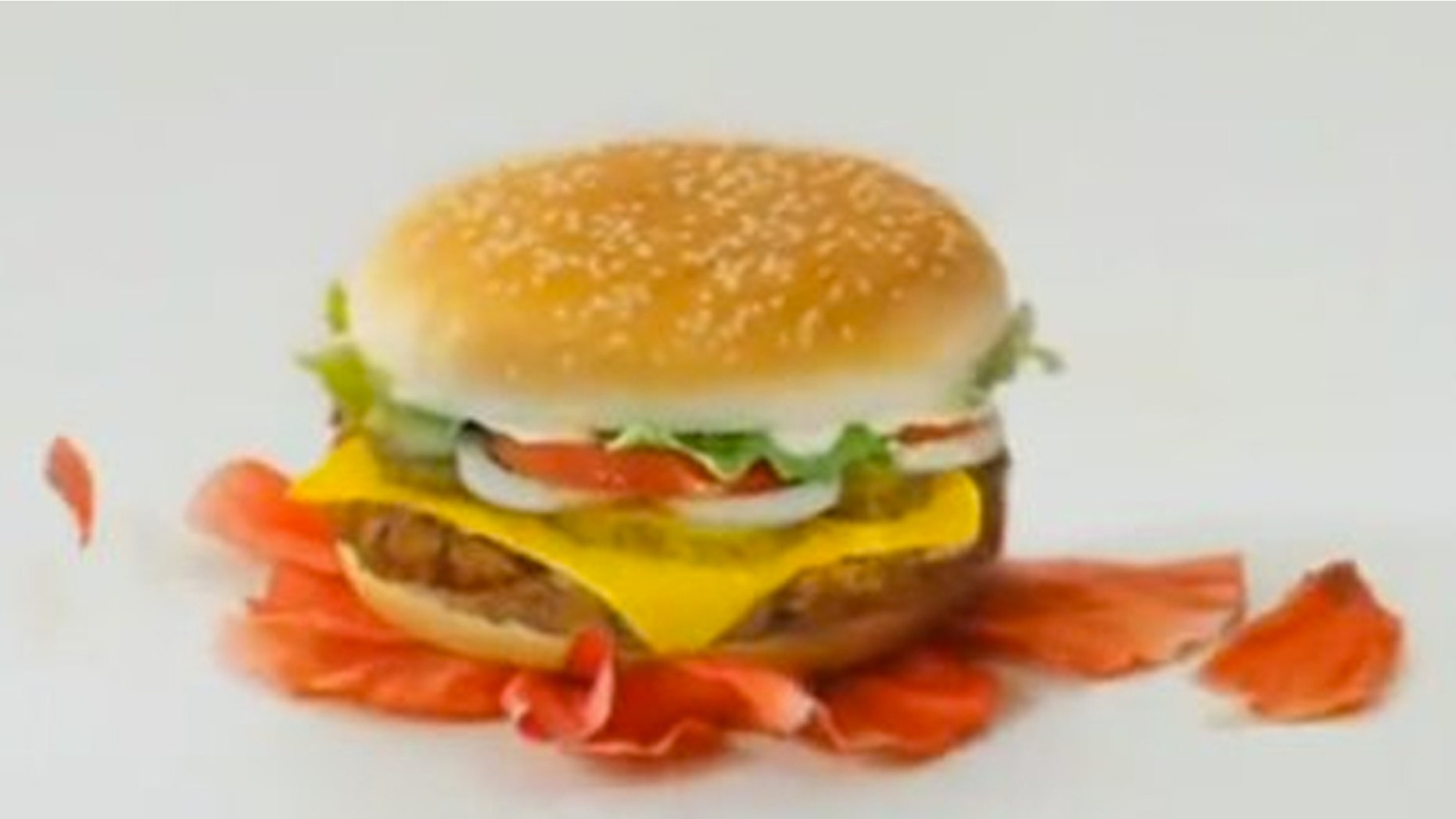 The controversial ad shows a Whopper smashing a poppy flower.