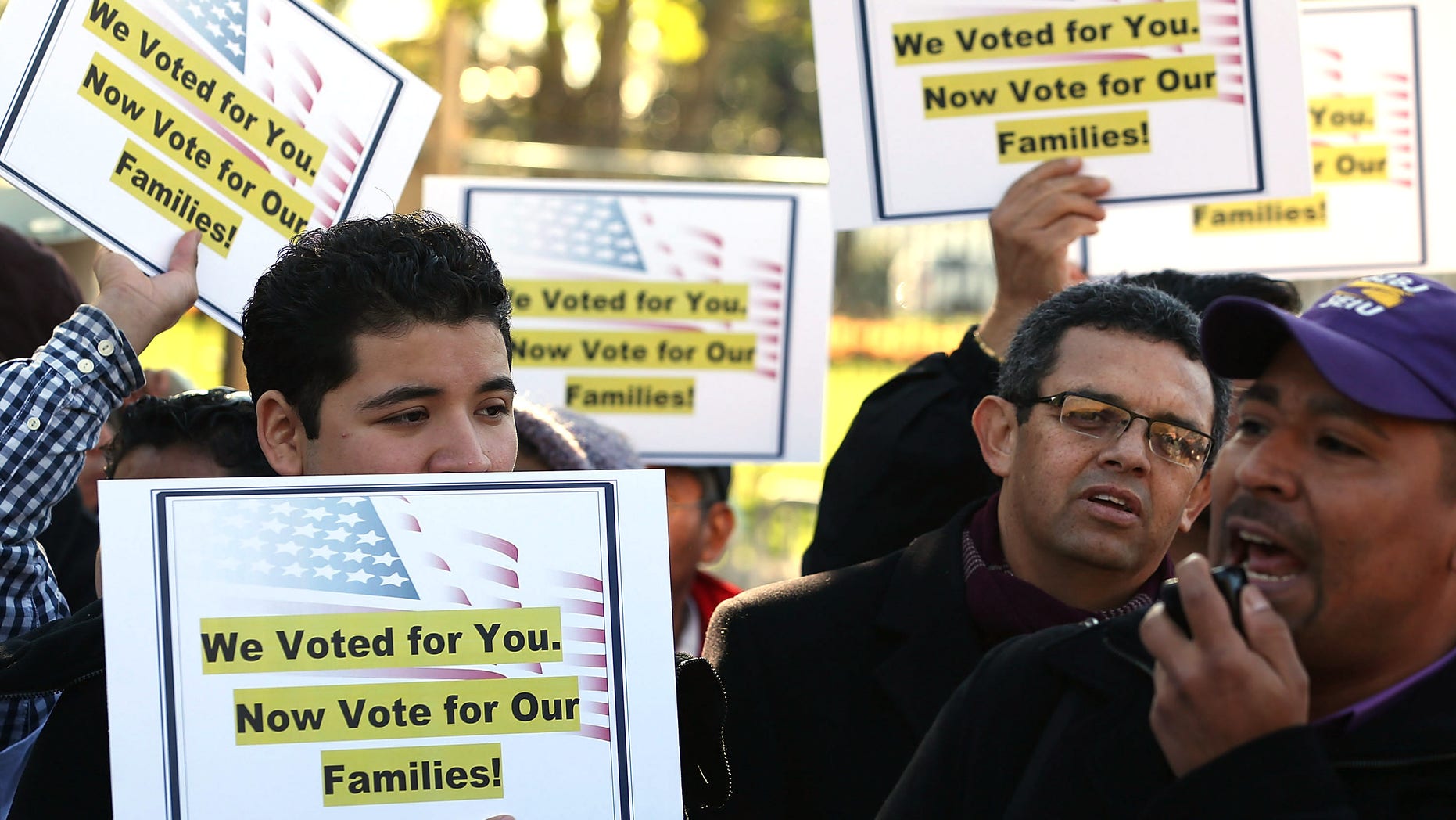 WASHINGTON, DC - NOVEMBER 08: Latinos and immigrants participate in a rally on immigration reform in front of the White House on November 8, 2012 in Washington, DC. Immigrant rights organizations called on President Barack Obama to fulfill his promise of passing comprehensive immigration reform. (Photo by Mark Wilson/Getty Images)