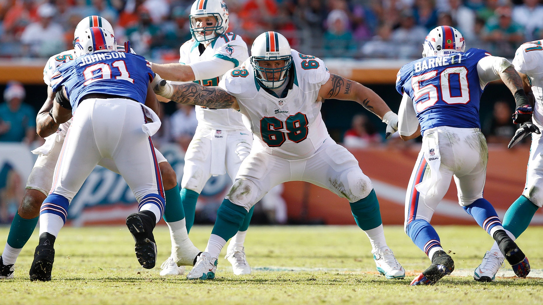 MIAMI GARDENS, FL - DECEMBER 23: Richie Incognito #68 of the Miami Dolphins defends against the Buffalo Bills on December 23, 2012 at Sun Life Stadium in Miami Gardens, Florida. The Dolphins defeated the Bills 24-10. (Photo by Joel Auerbach/Getty Images)