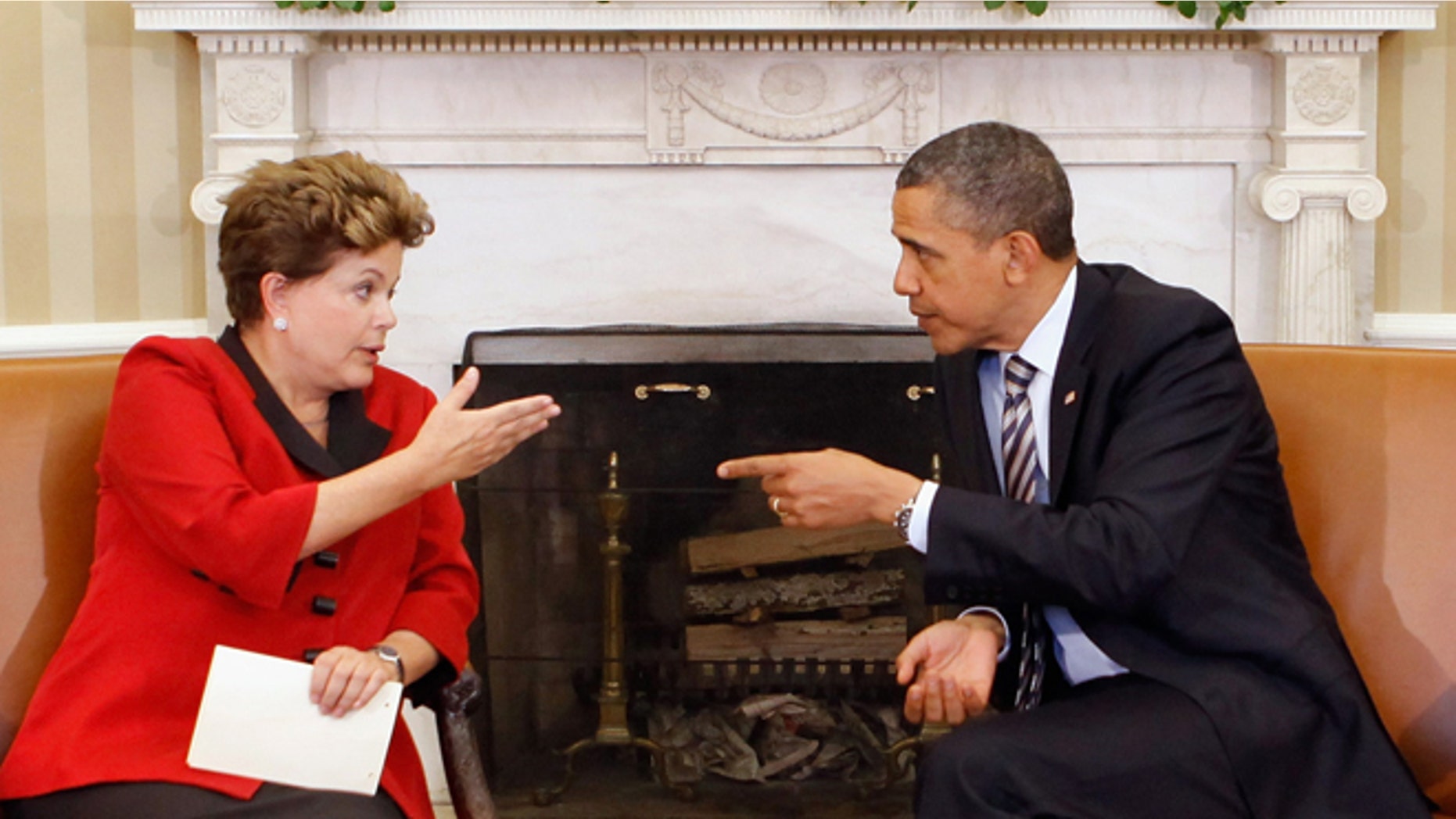 U.S. President Barack Obama and Brazilian President Dilma Rousseff meet in the Oval Office on April 9, 2012.