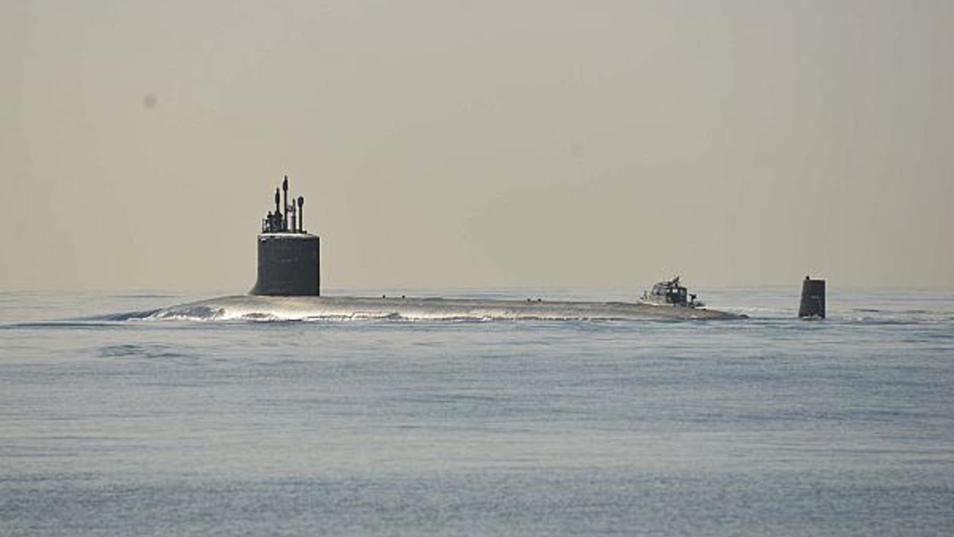 150113-N-DB801-066
PEARL HARBOR (Jan. 13, 2015) The Virginia-class attack submarine USS North Carolina (SSN 777) is underway conducting routine operations. (U.S. Navy photo by Mass Communication Specialist 1st Class Steven Khor/Released)