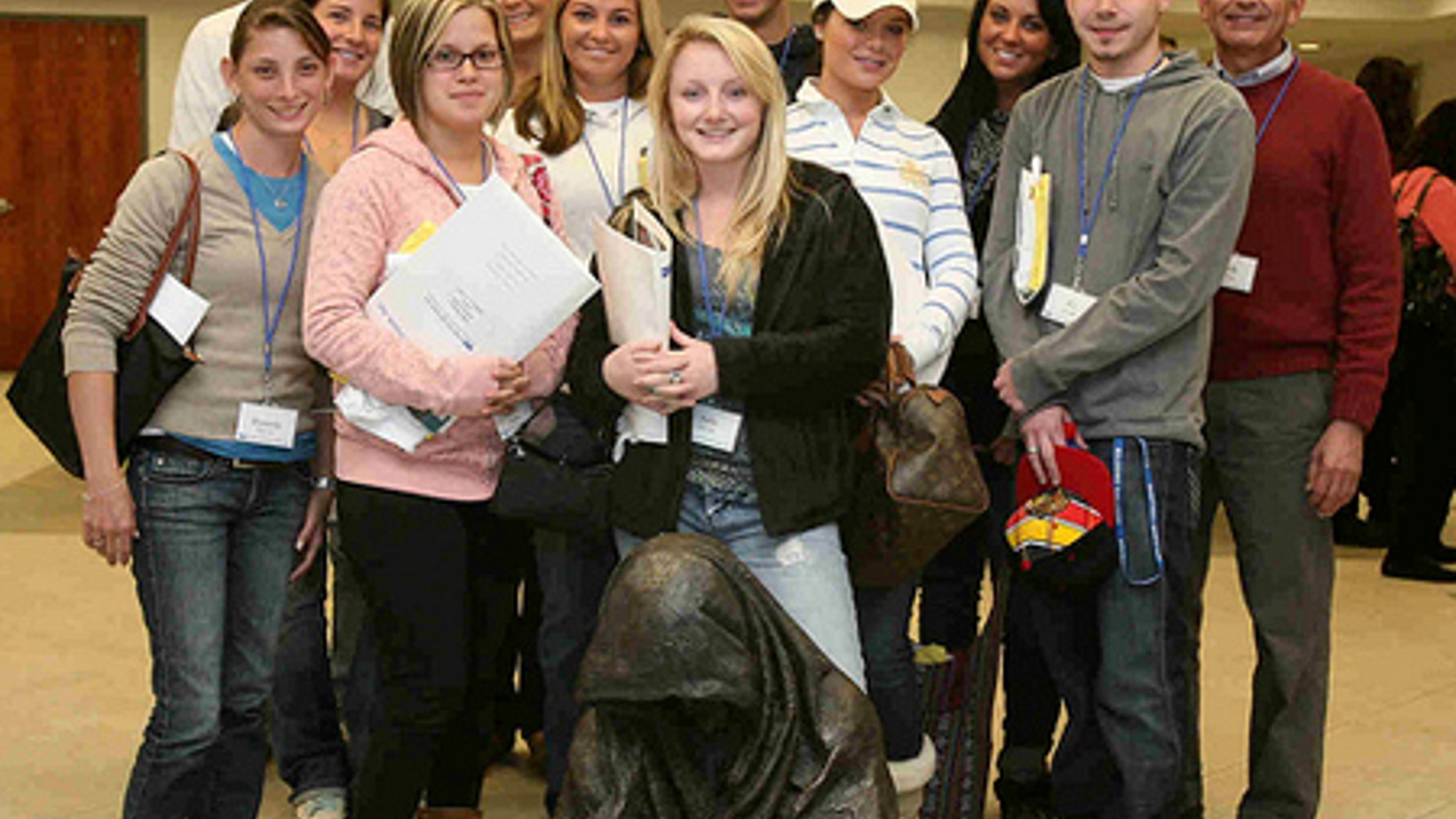 Americans still missing in Haiti include Stephanie Crispinelli, third from left; Courtney Hayes, fourth from right; Britney Gengel, third from right; and Prof. Richard Bruno, right.