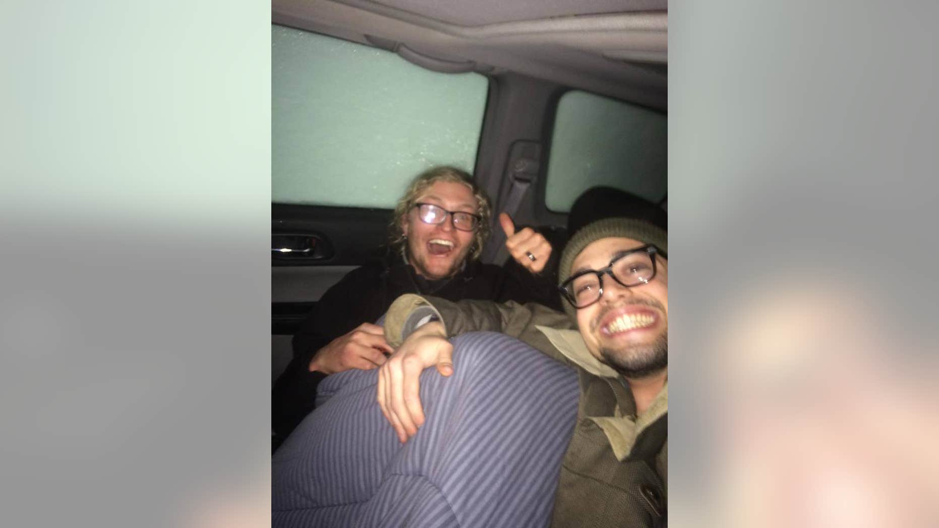Neale Allen Shutler, left, and David Ortiz took selfies and bundled under a blanket.