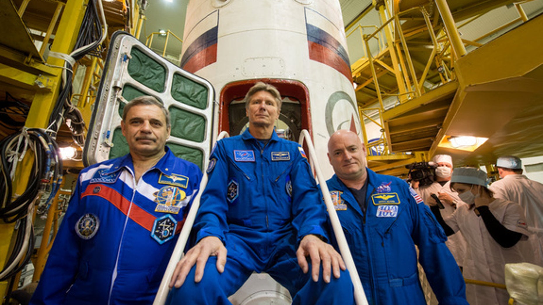 NASA's Scott Kelly (right) and cosmonaut Mikhail Kornienko (left) will fly to the International Space Station for a yearlong stay in space on March 27, 2015. Cosmonaut Gennady Padalka (center) will join them on the station for about six months.