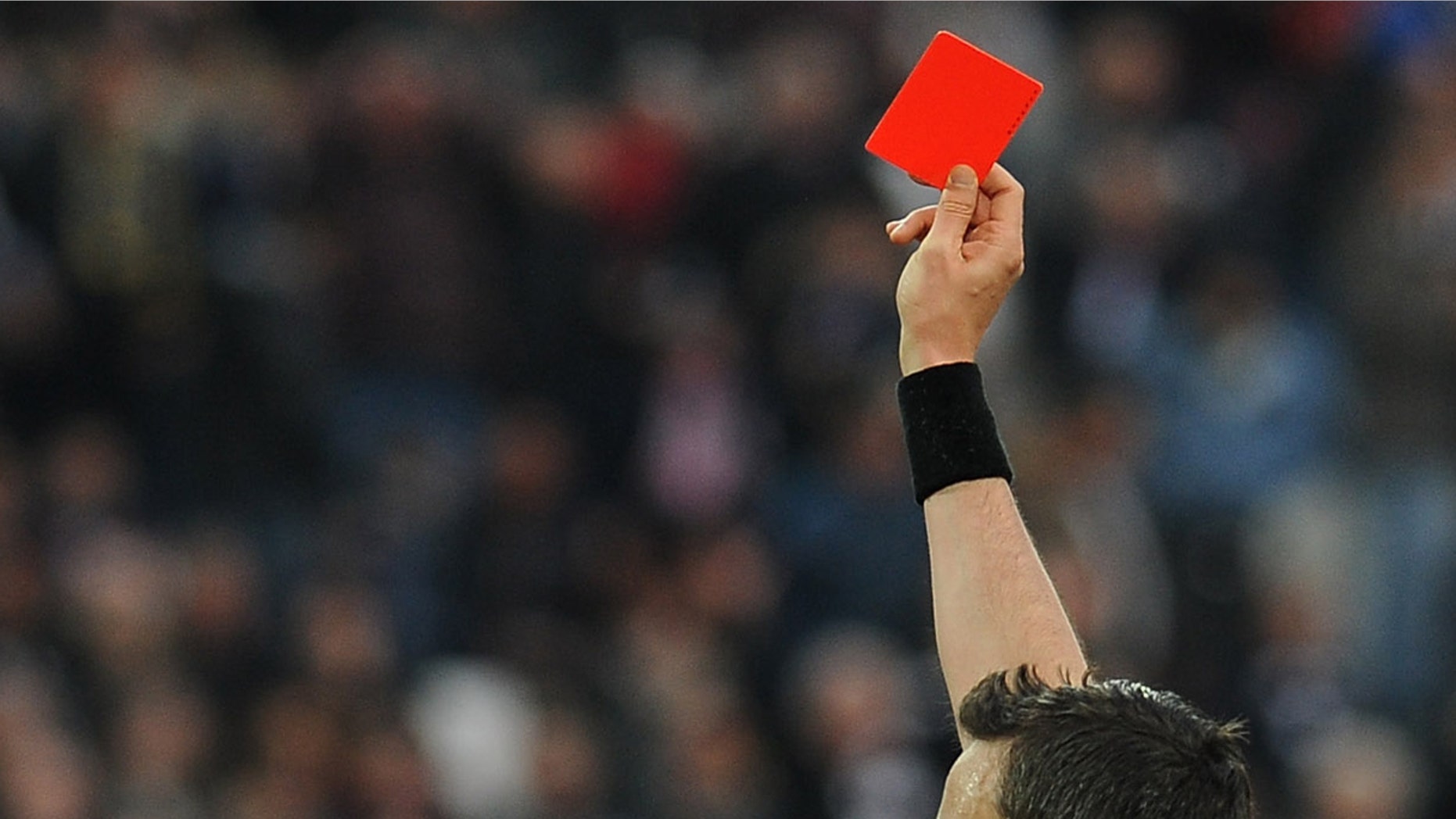 TURIN, ITALY - APRIL 06: Giuseppe Rizzo (C) of Pescara receives the red card from referee Sebastiano Peruzzo during the Serie A match between Juventus and Pescara at Juventus Arena on April 6, 2013 in Turin, Italy. (Photo by Valerio Pennicino/Getty Images)