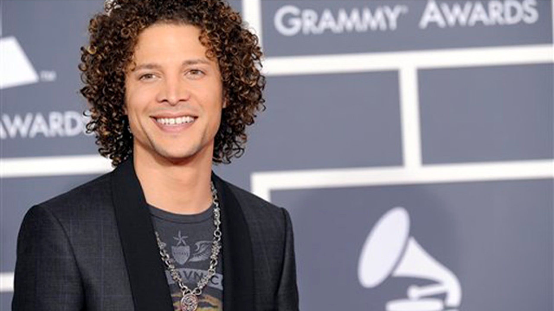 Justin Guarini arrives at the Grammy Awards on Sunday, Jan. 31, 2010, in Los Angeles. (AP Photo/Chris Pizzello)