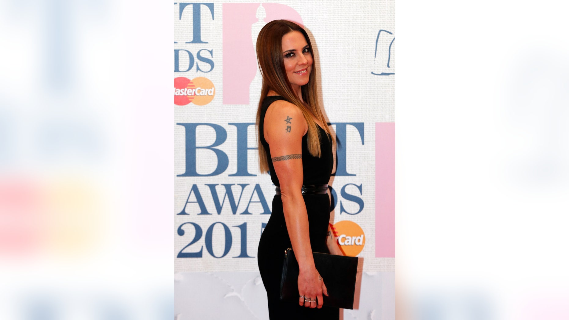 Former Spice Girl Melanie Chisholm (Sporty Spice) arrives for the BRIT music awards at the O2 Arena in Greenwich, London, February 25, 2015.