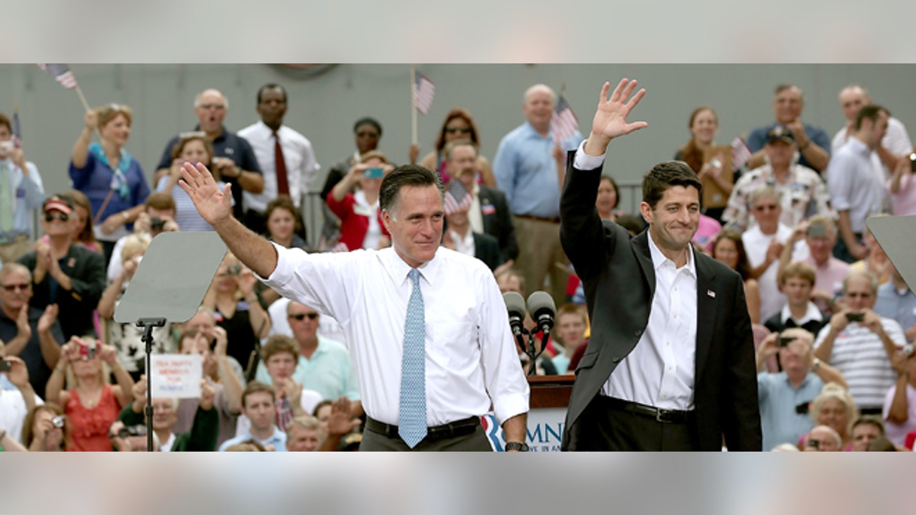 NORFOLK, VA - AUGUST 11: Republican presidential candidate, former Massachusetts Gov. Mitt Romney (L) announces Rep. Paul Ryan (R-WI) (R) as his running mate in front of the USS Wisconsin August 11, 2012 in Norfolk, Virginia. Ryan, a seven term congressman, is Chairman of the House Budget Committee and provides a strong contrast to the Obama administration on fiscal policy. (Photo by Win McNamee/Getty Images)
