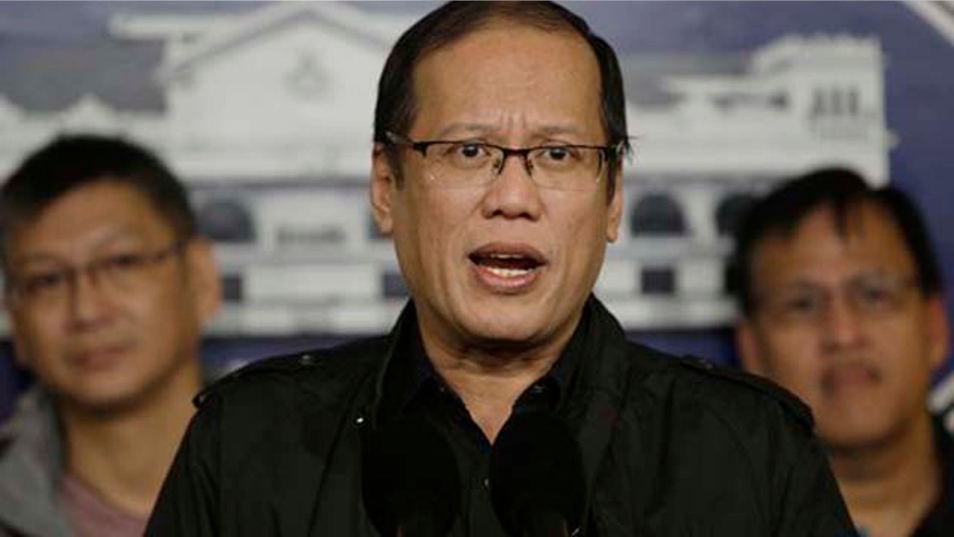 January 8, 2012: Philippine President Benigno Aquino III, center, talks during a hastily called press conference at the Malacanang palace in Manila, Philippines.