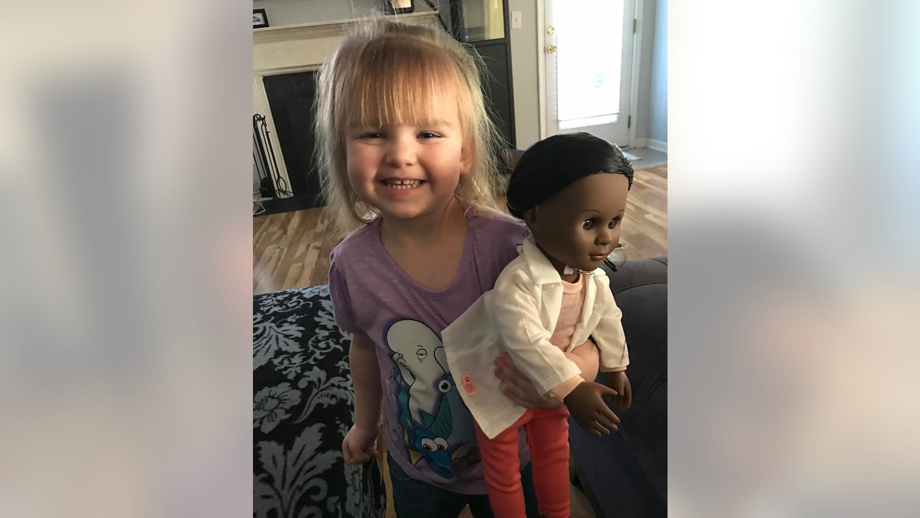 Sophia showing off her doll.