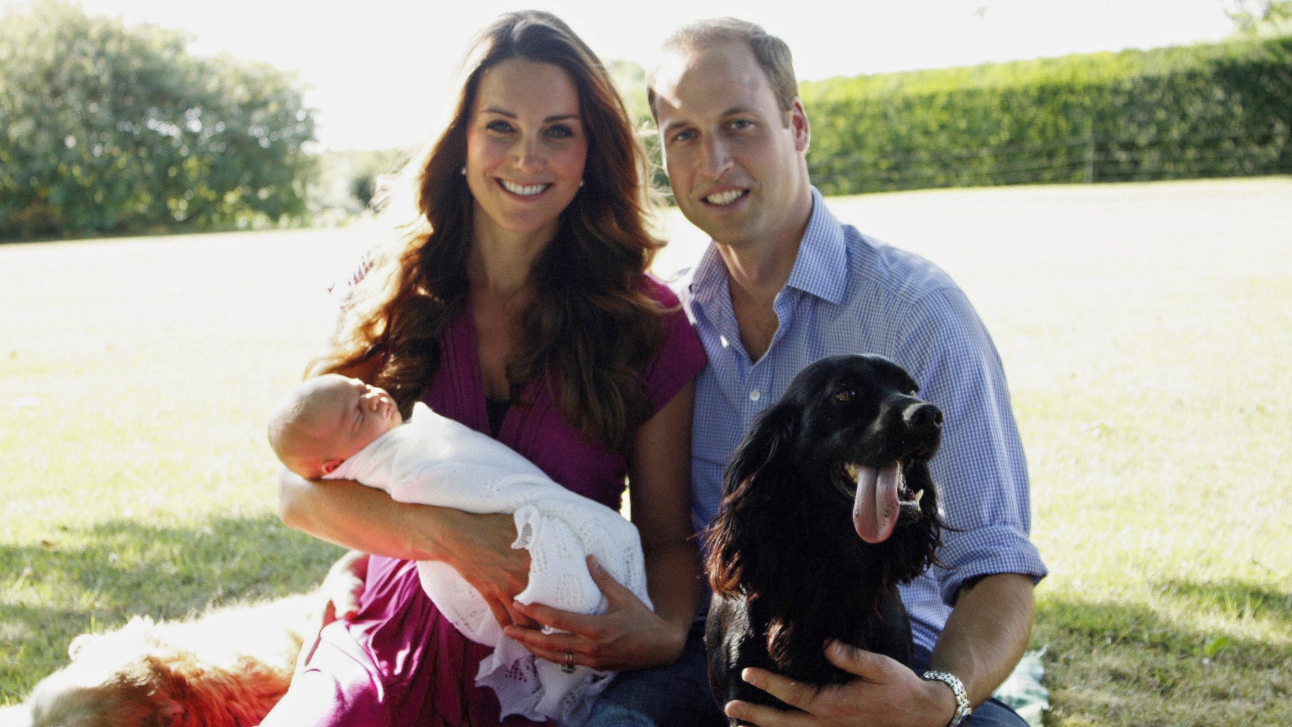 The royal couple with their son, Prince George in August 2013 in Bucklebury, Berkshire.