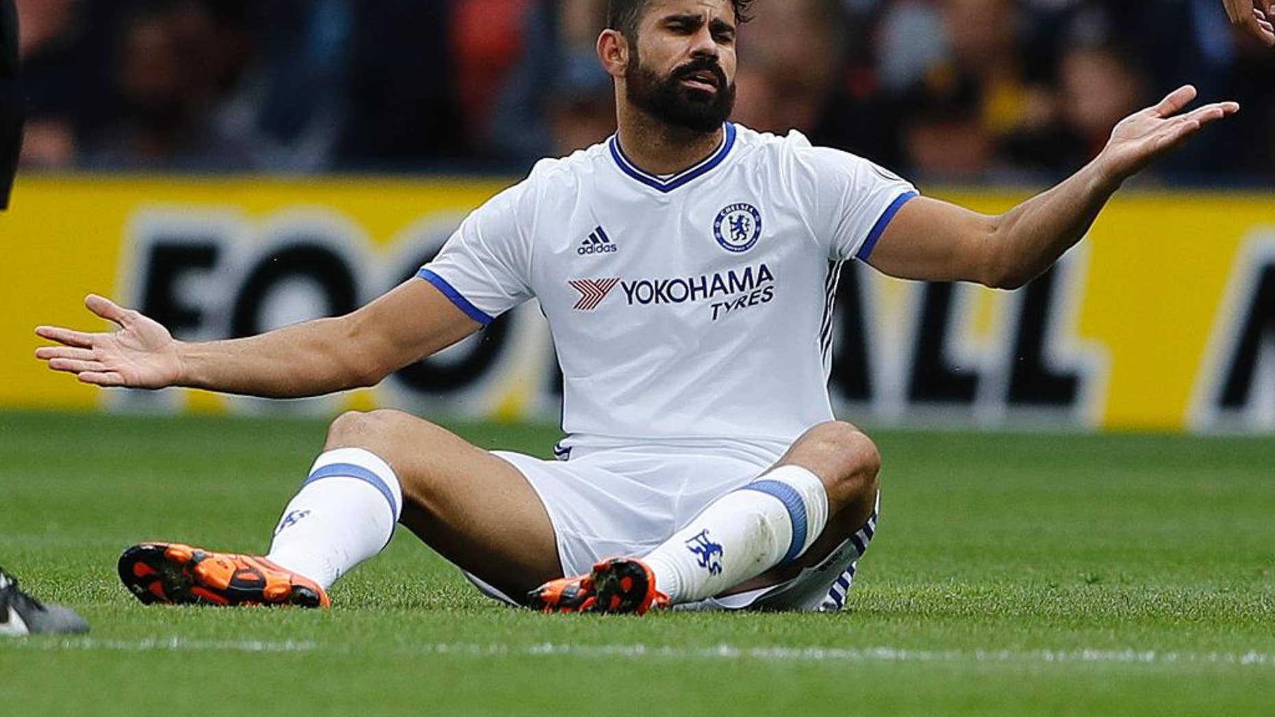 Chelsea's Diego Costa gestures during the English Premier League soccer match between Watford and Chelsea at Vicarage Road stadium in London, Saturday, Aug. 20, 2016.(AP Photo/Frank Augstein)
