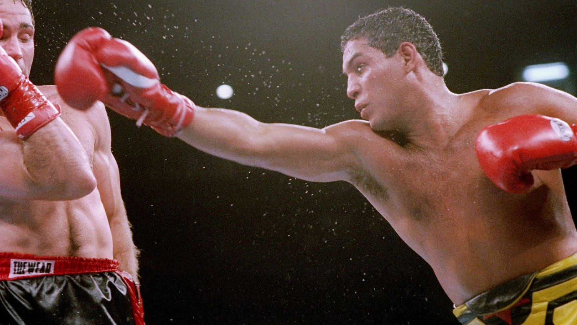 19 Jun 1993: Hector Camacho trades blows with Tom Alexander. Mandatory Credit: Holly Stein /Allsport