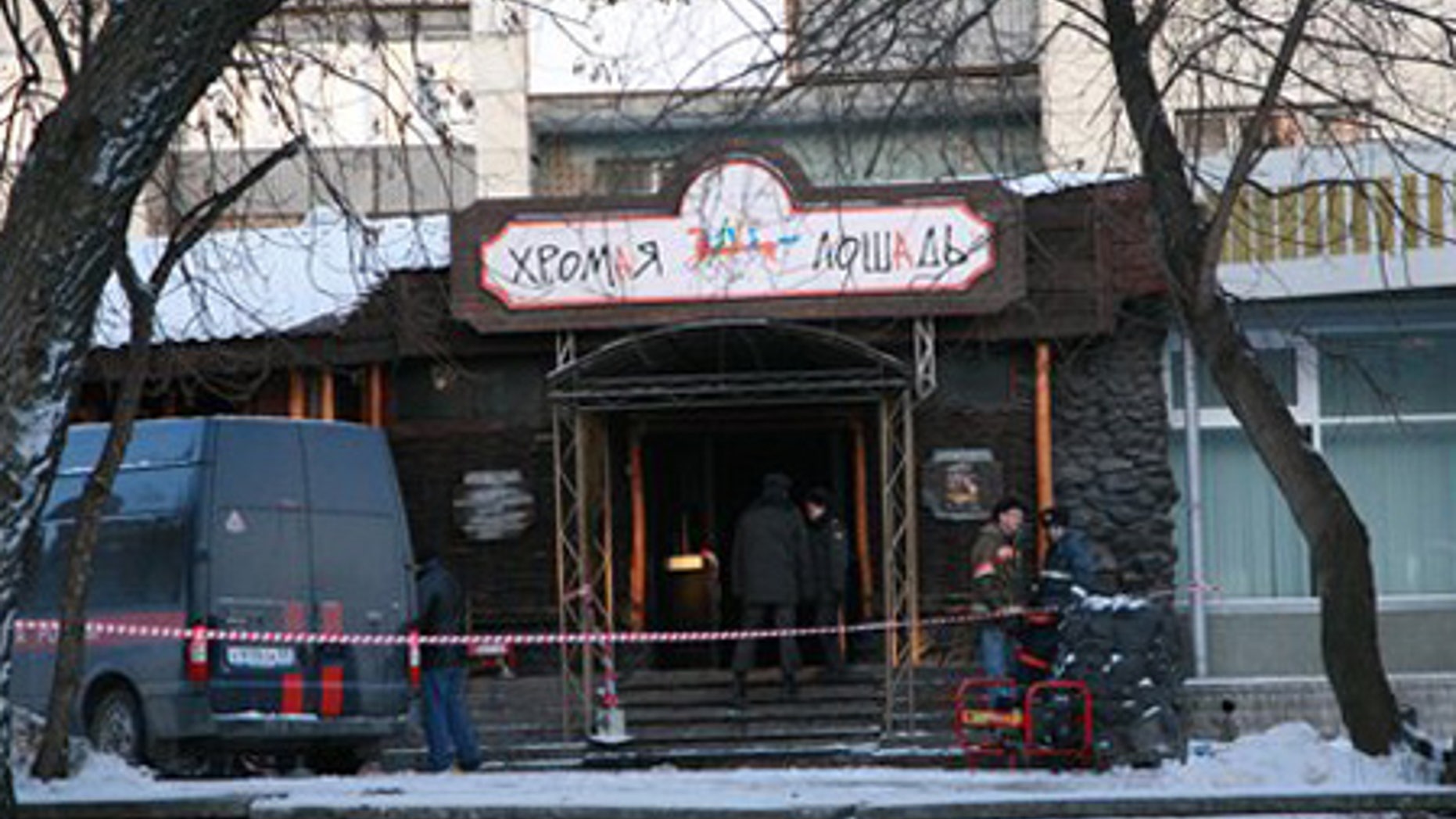 Dec. 5: Russian police officers guard outside a nightclub in Perm, Russia.