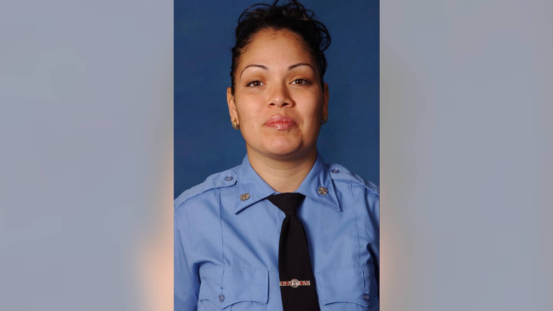 This undated photo provided by the Fire Department of New York shows FDNY emergency medical technician Yadira Arroyo. Police said the EMT in New York City died after she was run over Thursday, March 16, 2017, by her own ambulance that had just been stolen. (Fire Department of New York via AP)