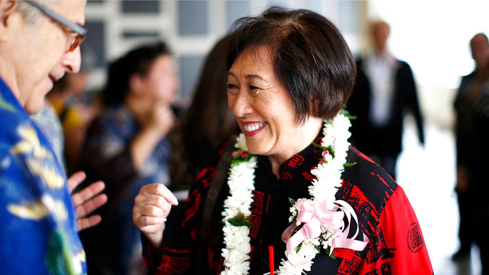 In this April 28, 2018 photo, U.S. Rep. Colleen Hanabusa, D-Hawaii, who is giving up her seat in Congress to run for Hawaii governor, talks with a guest at an event in Honolulu. Hanabusa lost the Democratic gubernatorial nomination to Gov. David Ige in the Democratic primary on Saturday, Aug. 11, 2018.