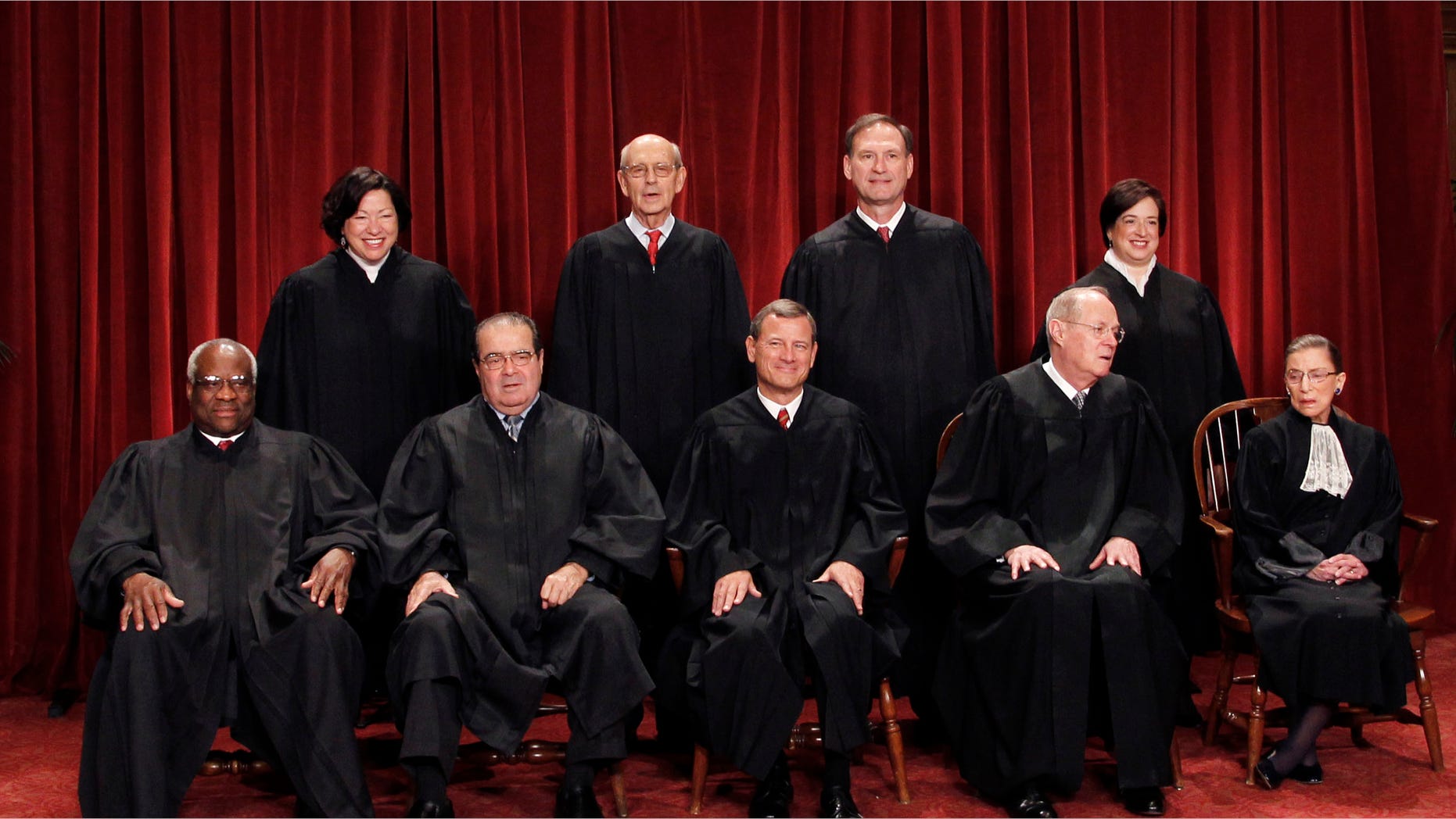 FILE: Oct. 8, 2010: The high court justices are shown in a group portrait at the Supreme Court Building in Washington.