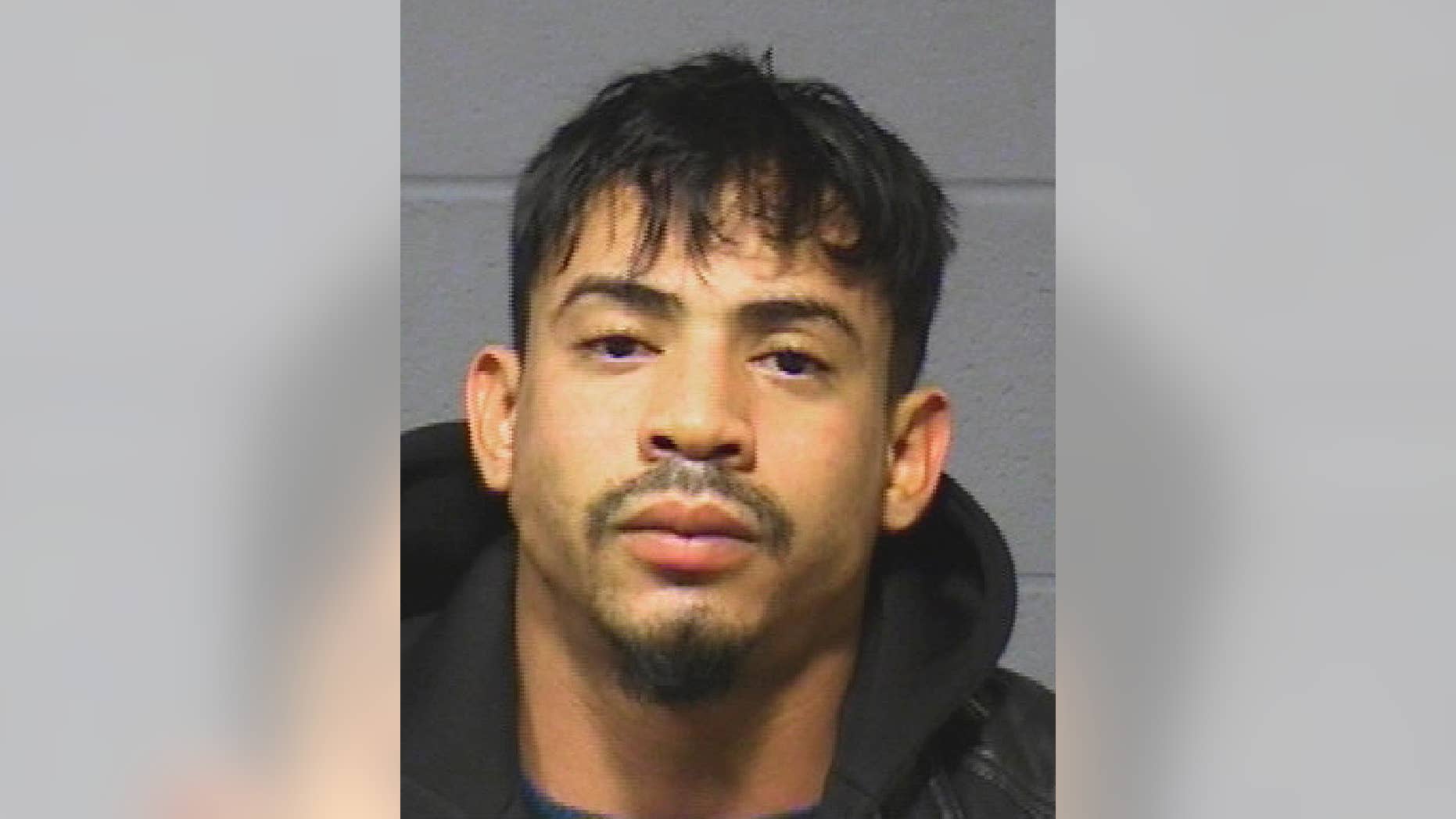 This booking photograph released Monday, Dec. 7, 2015, by the Hartford, Conn., Police Department shows Amador Medina, arrested Friday on fugitive from justice charges, and suspected of stealing skeletal remains from a Worcester, Mass., cemetery. Medina is scheduled to be arraigned Monday in Hartford. Police said they recovered the remains of five bodies after going to his Hartford home on Friday. (Hartford Police Department via AP)