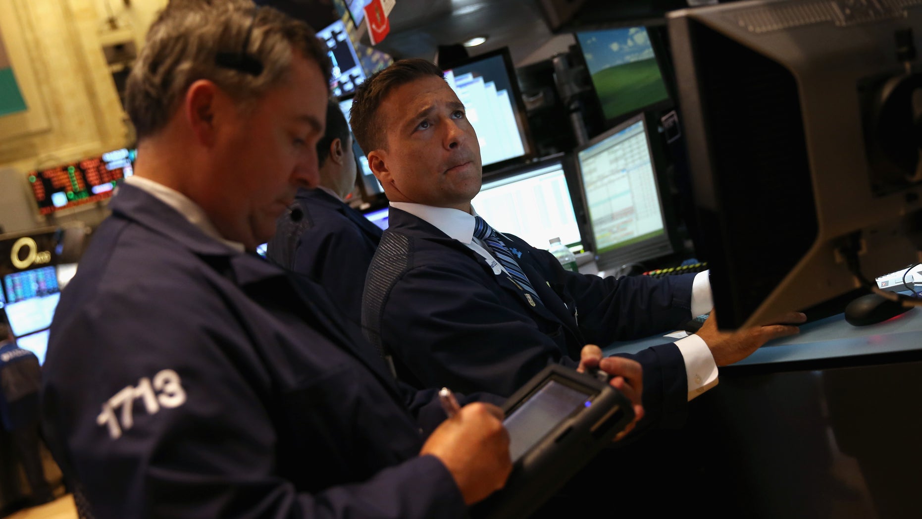 Traders work the floor of the New York Stock Exchange on September 16, 2013 in New York City.