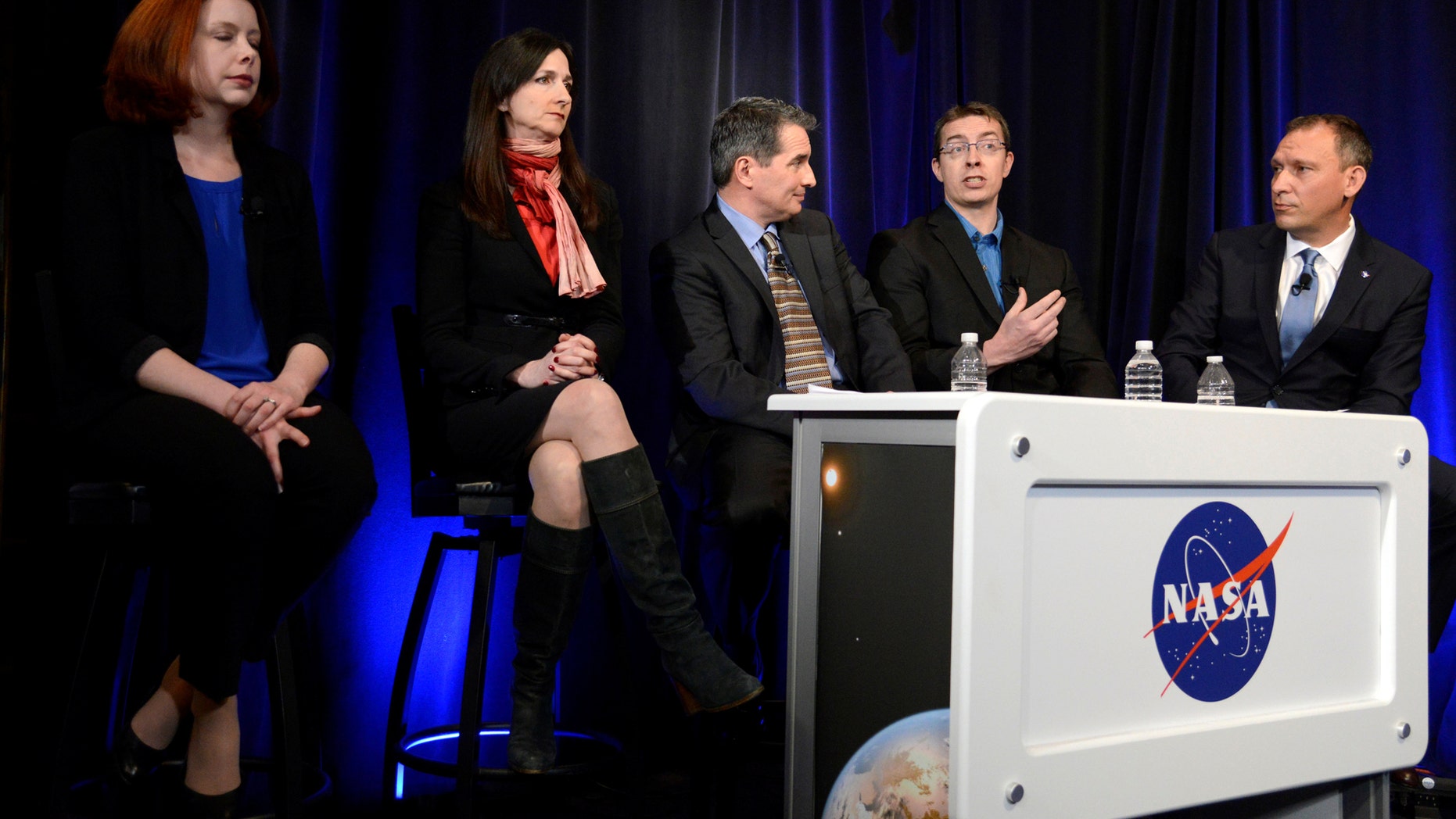 File photo: University of Liege (Belgium) astronomer Michael Gillon (2nd,R) makes remarks as (L-R) Space Telescope Science Institute astronomer Nikole Lewis, MIT Professor of planetary science and physics Sara Seager, Sean Carey of NASA's Spitzer Science Center and Associate Administrator for NASA's Science Mission Directorate Thomas Zurbuchen listen during a news conference, to present new findings on exoplanets, planets that orbit stars other than Earth's sun, in Washington, U.S., February 22, 2017. (REUTERS/Mike Theiler)