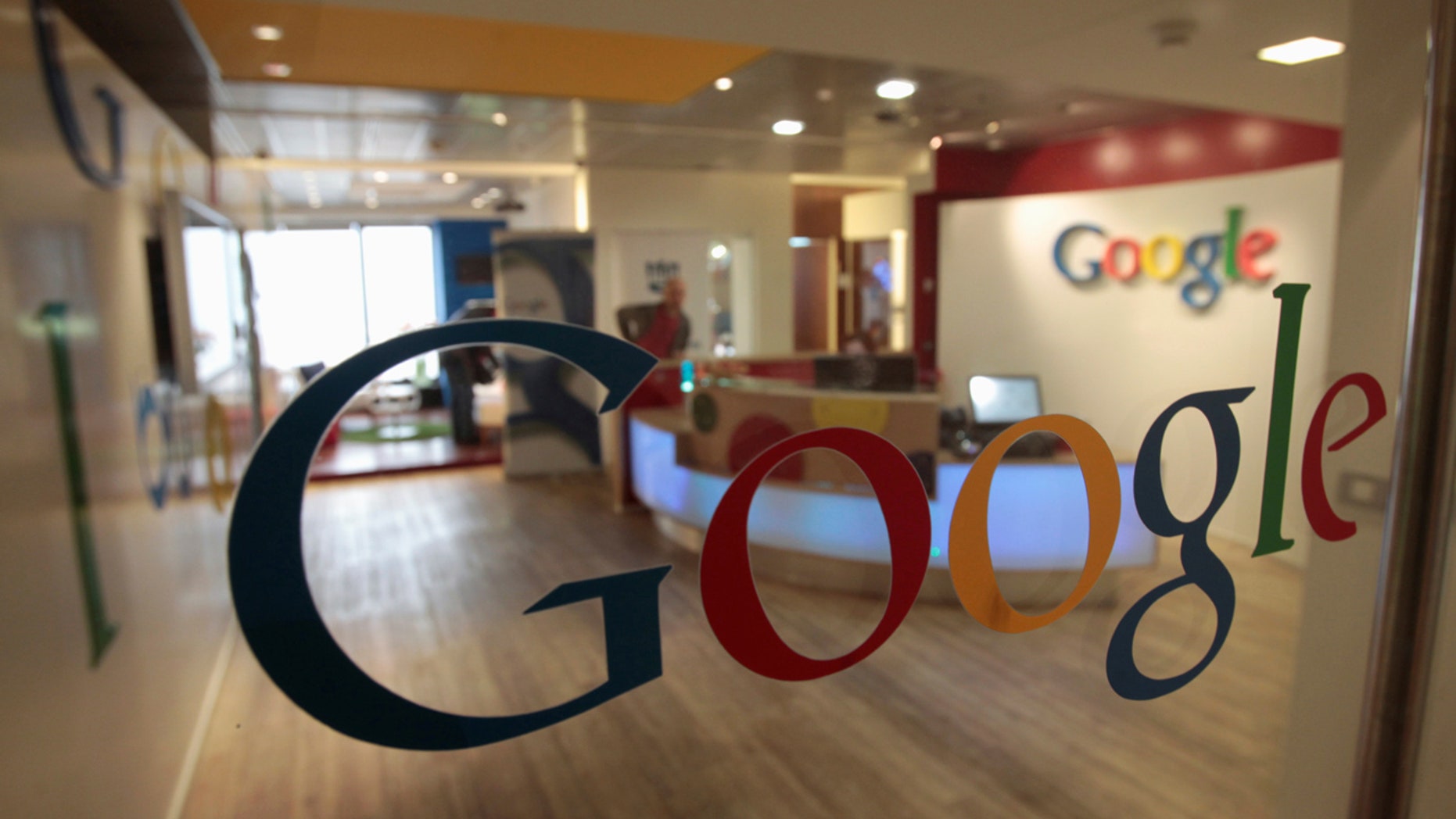 The Google logo is seen on a door at the company's office in Tel Aviv January 26, 2011.