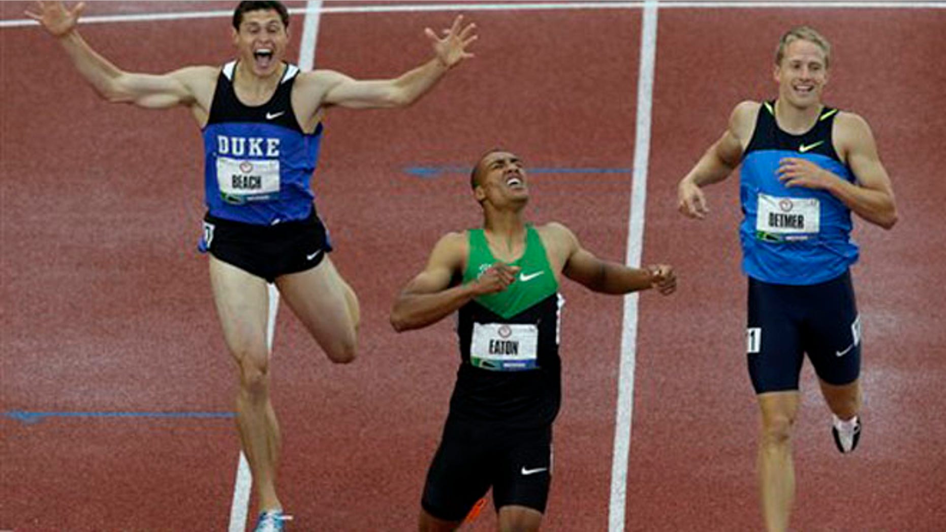 June 23, 2012: Ashton Eaton reacts with Curtis Beach and Joe Detmer after the 1500m during the decathlon competition at the U.S. Olympic Track and Field Trials in Eugene, Ore.