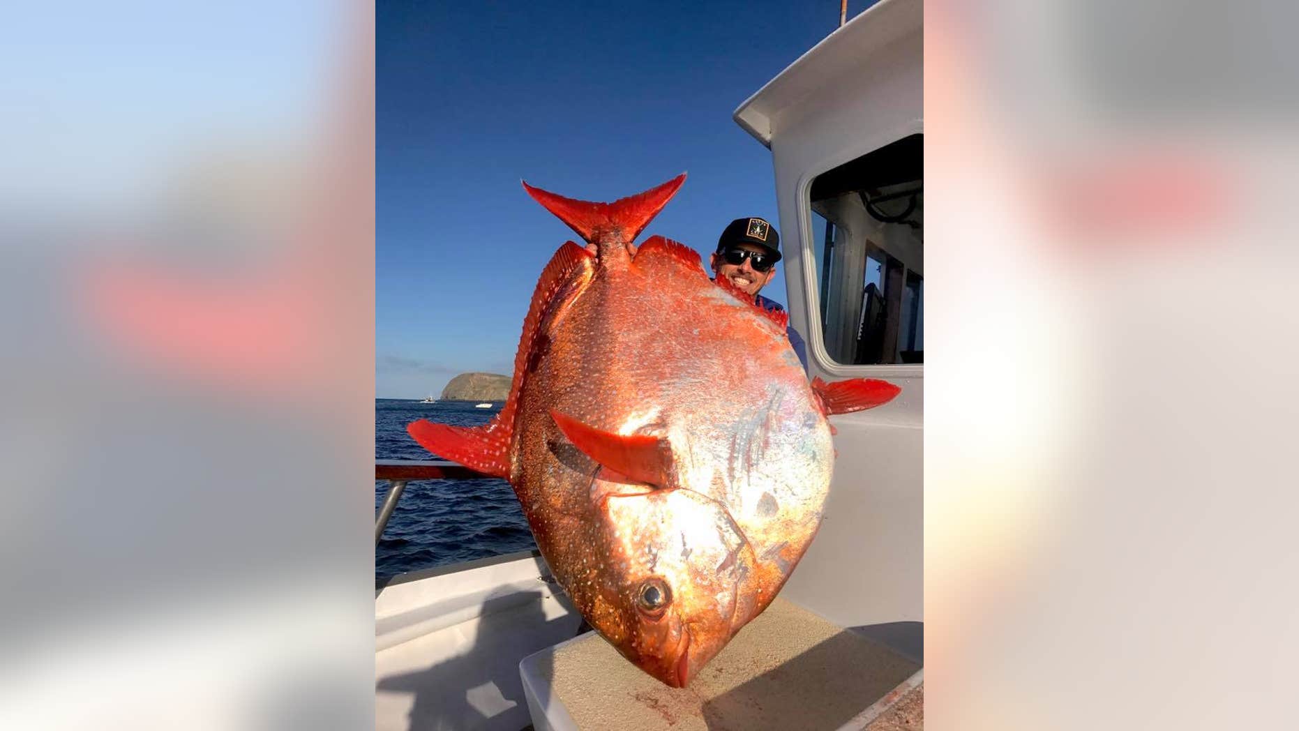 Shawn Steward of Oxnard, Calif., caught a rare 90-pound opah off Southern California.